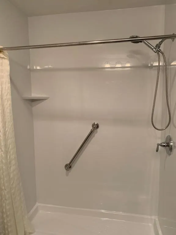 Shower in Blue Bay Inn and Suites