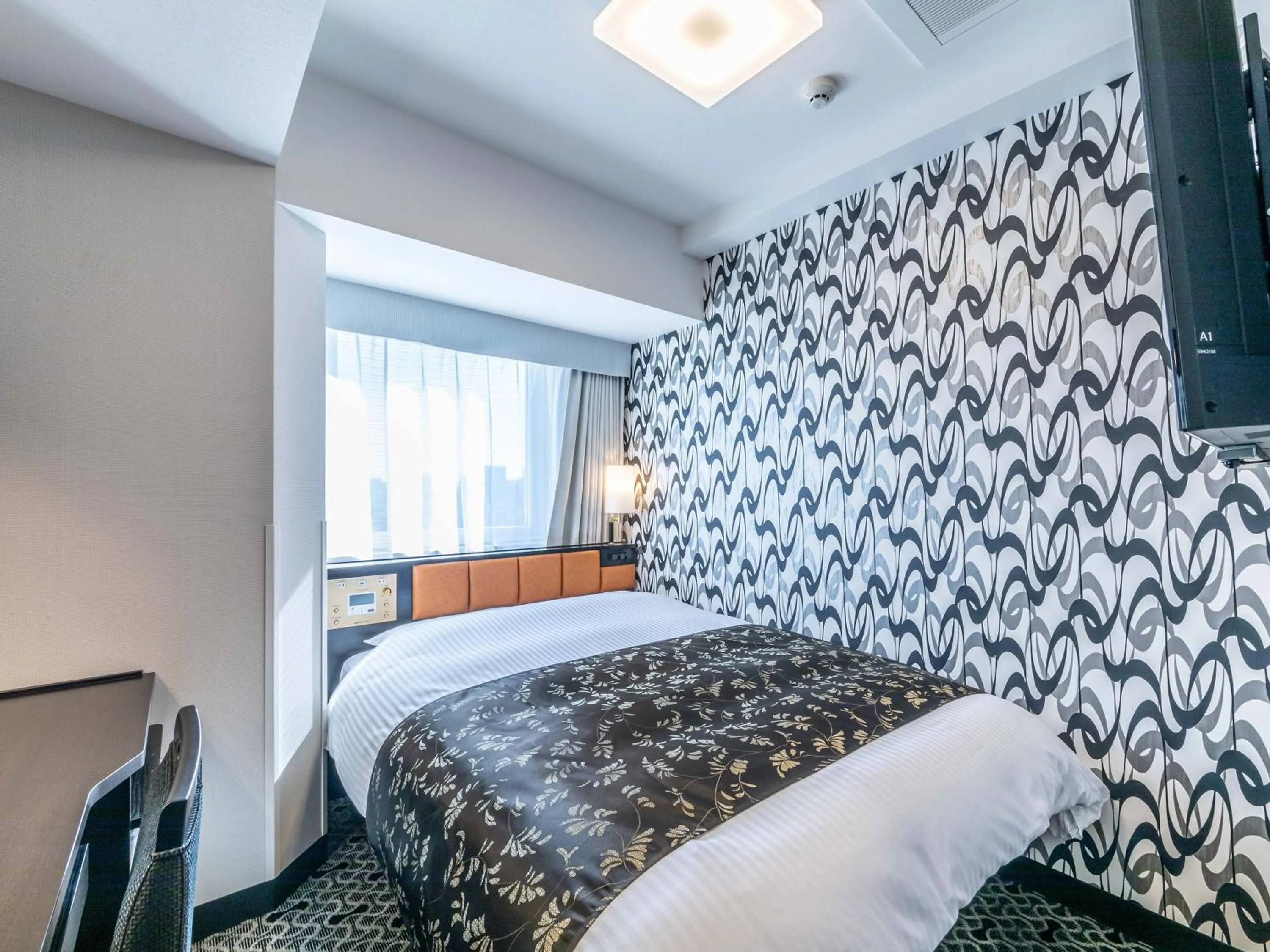 Photo of the whole room, Bed in APA Hotel & Resort Ryogoku Ekimae Tower