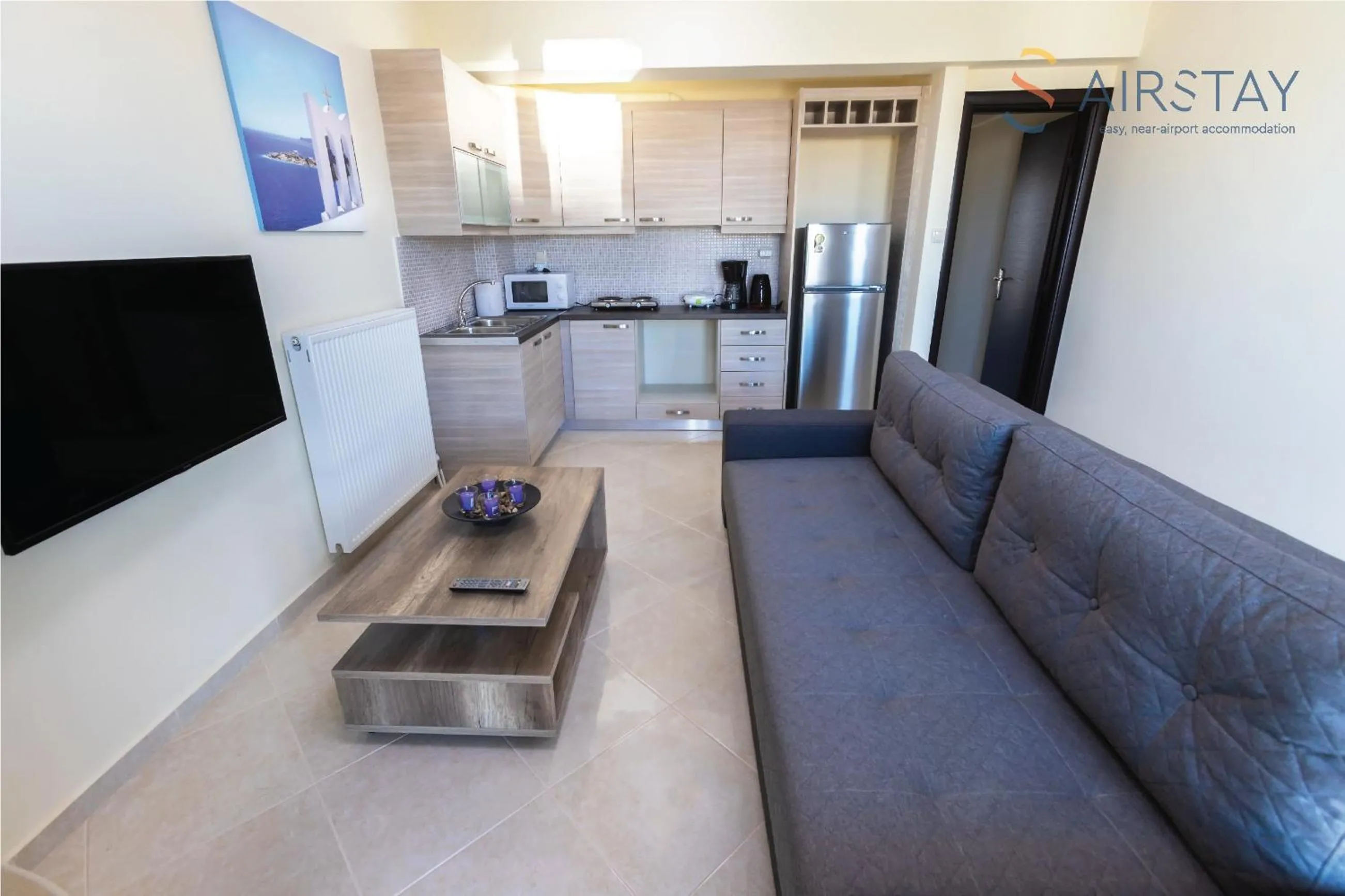 Living room in Thresh Apartments Airport by Airstay