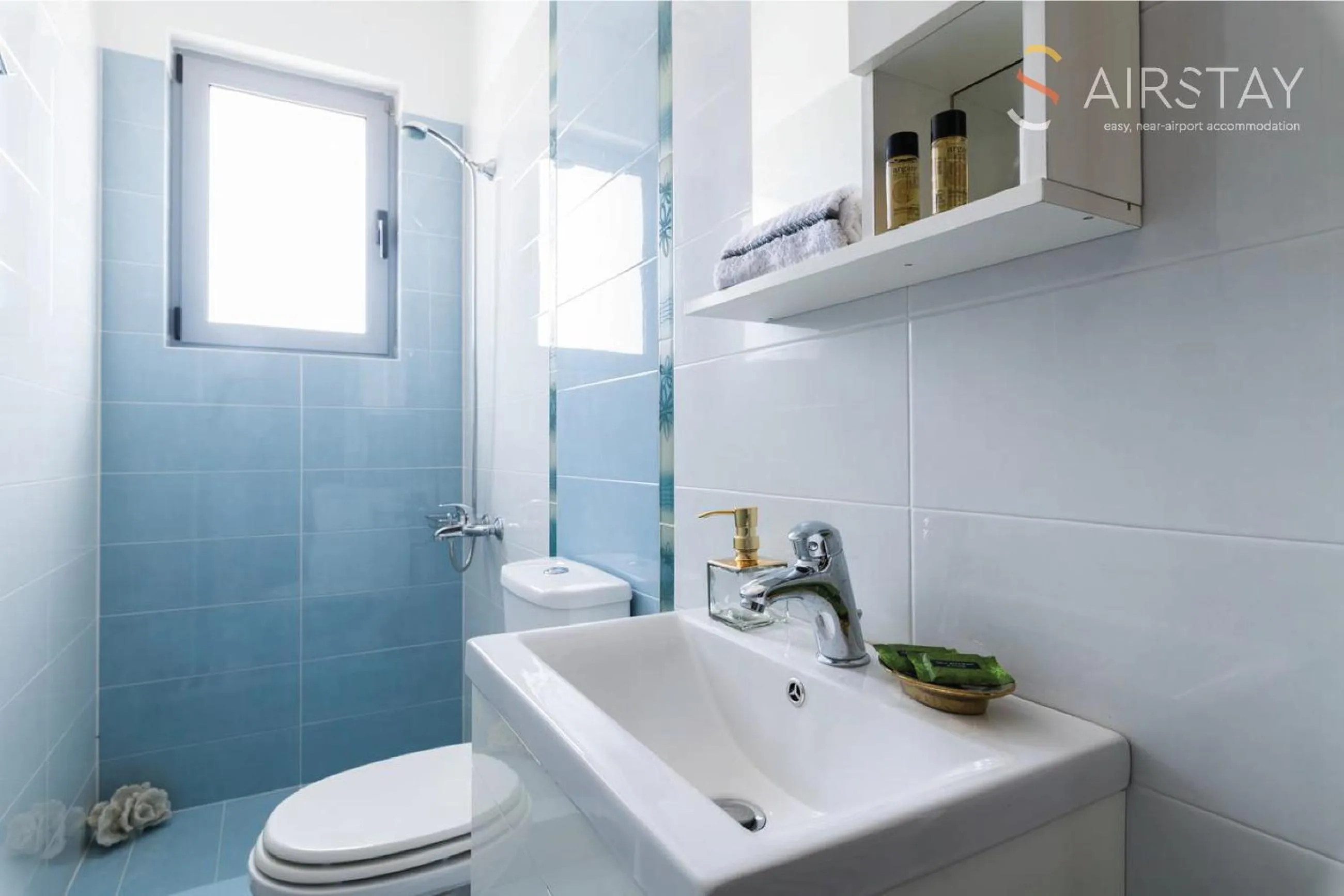 Shower in Thresh Apartments Airport by Airstay