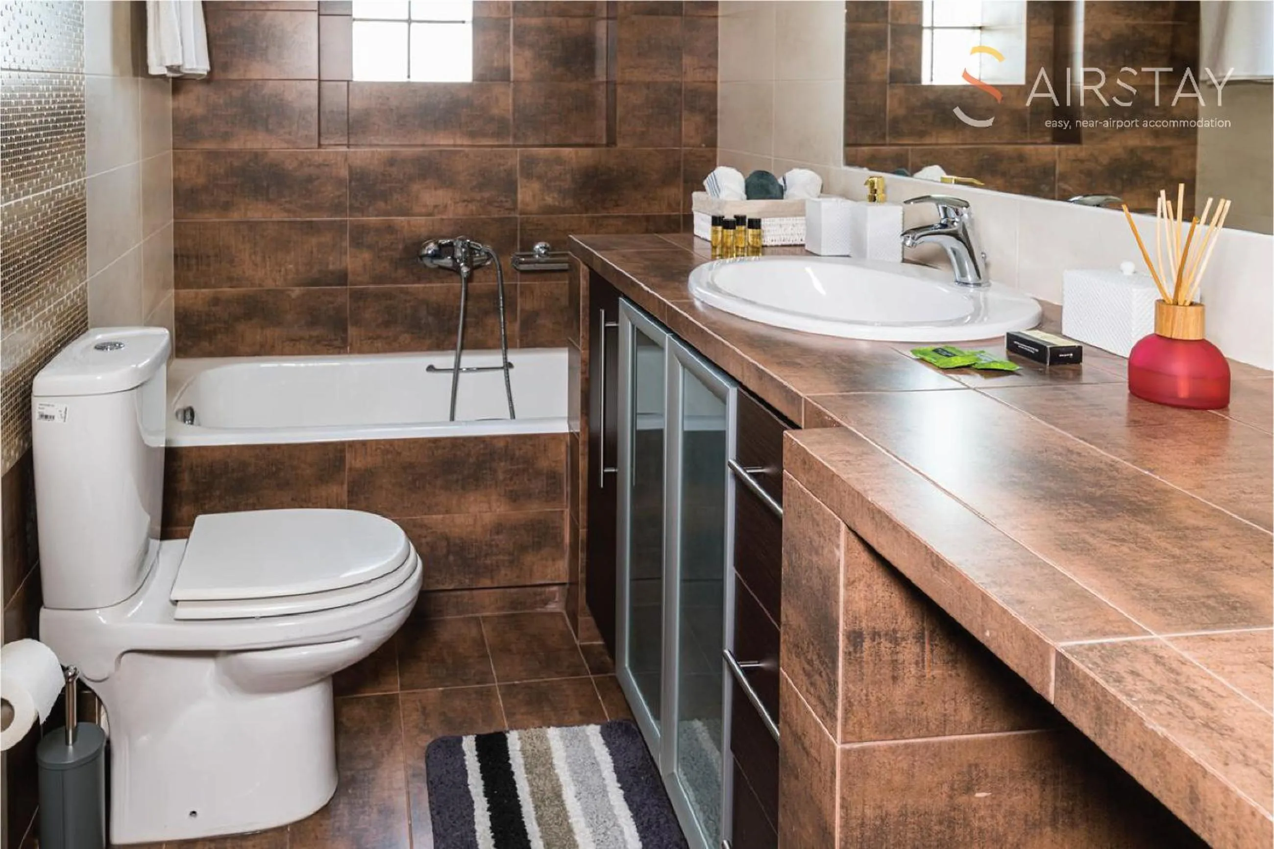 Bathroom in Thresh Apartments Airport by Airstay