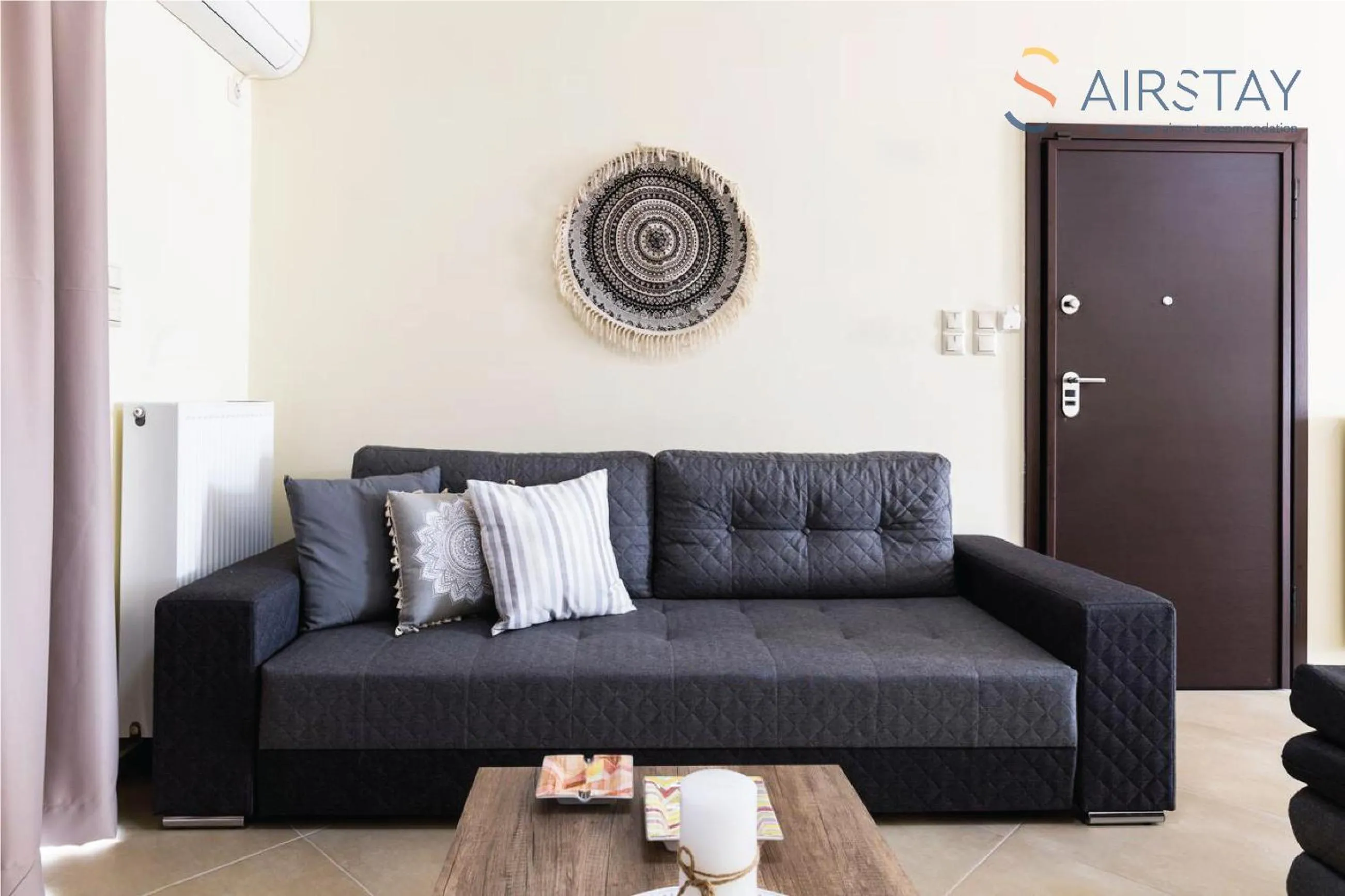 Living room in Thresh Apartments Airport by Airstay