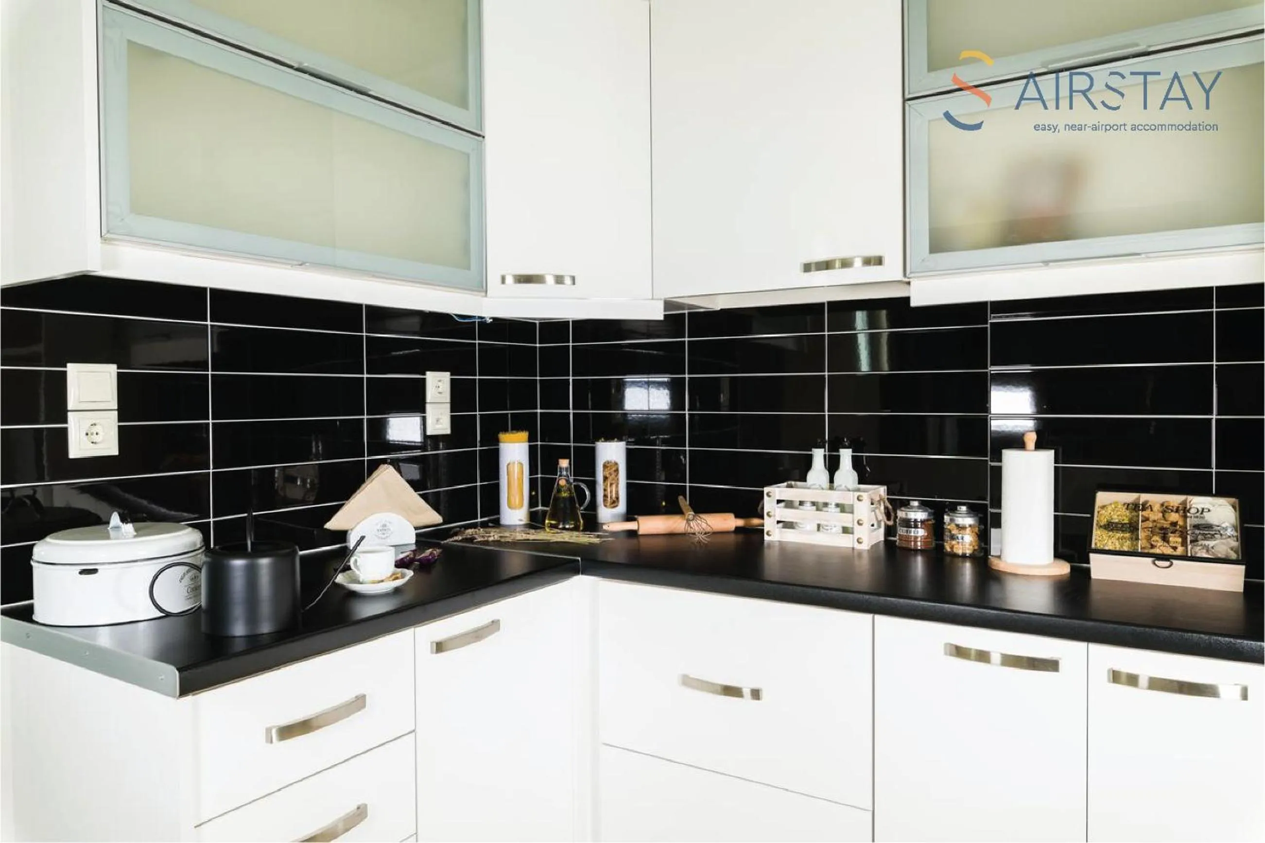 kitchen in Thresh Apartments Airport by Airstay