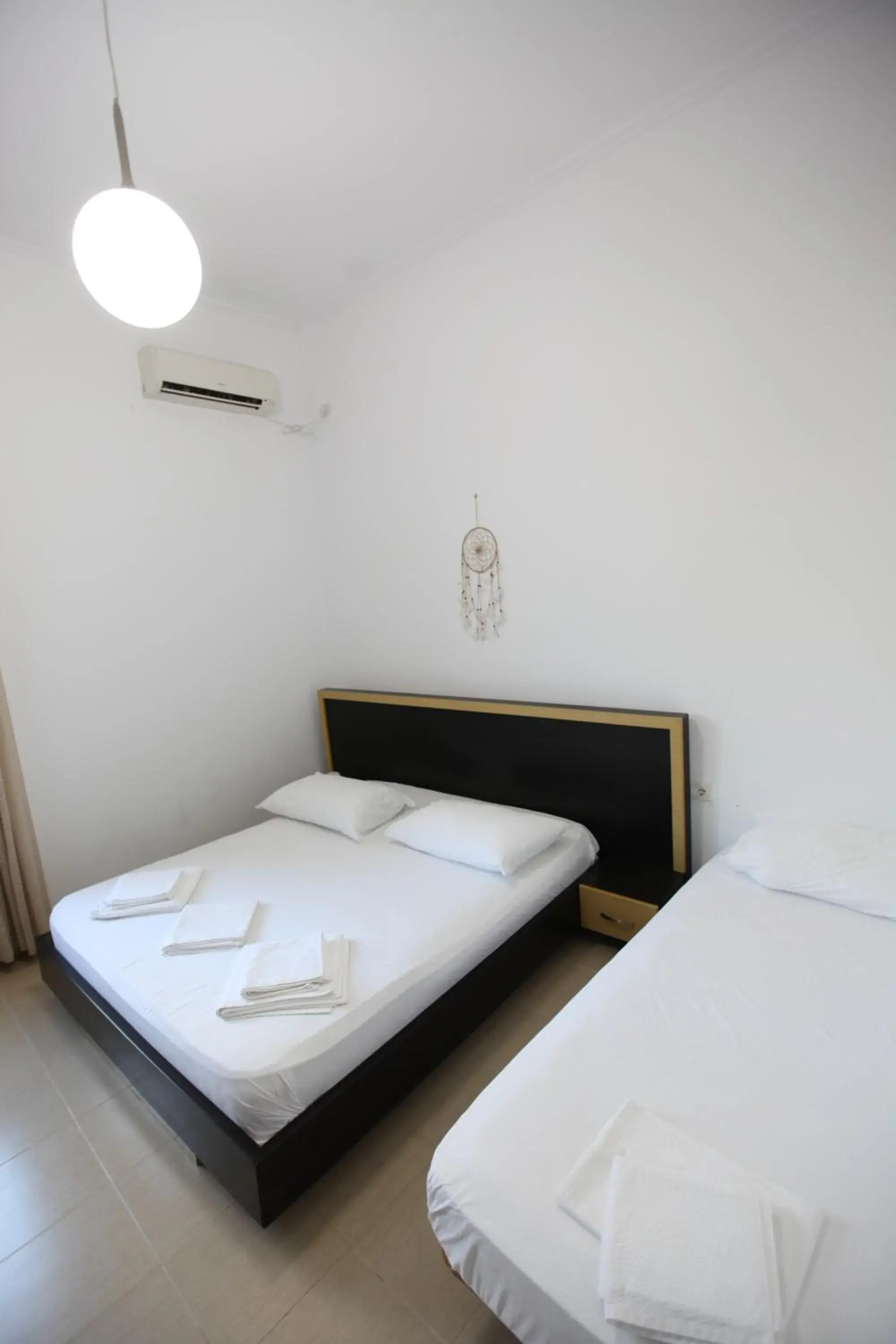 Triple Room in Bunec Beach Resort Triple Room in Bunec Beach Resort