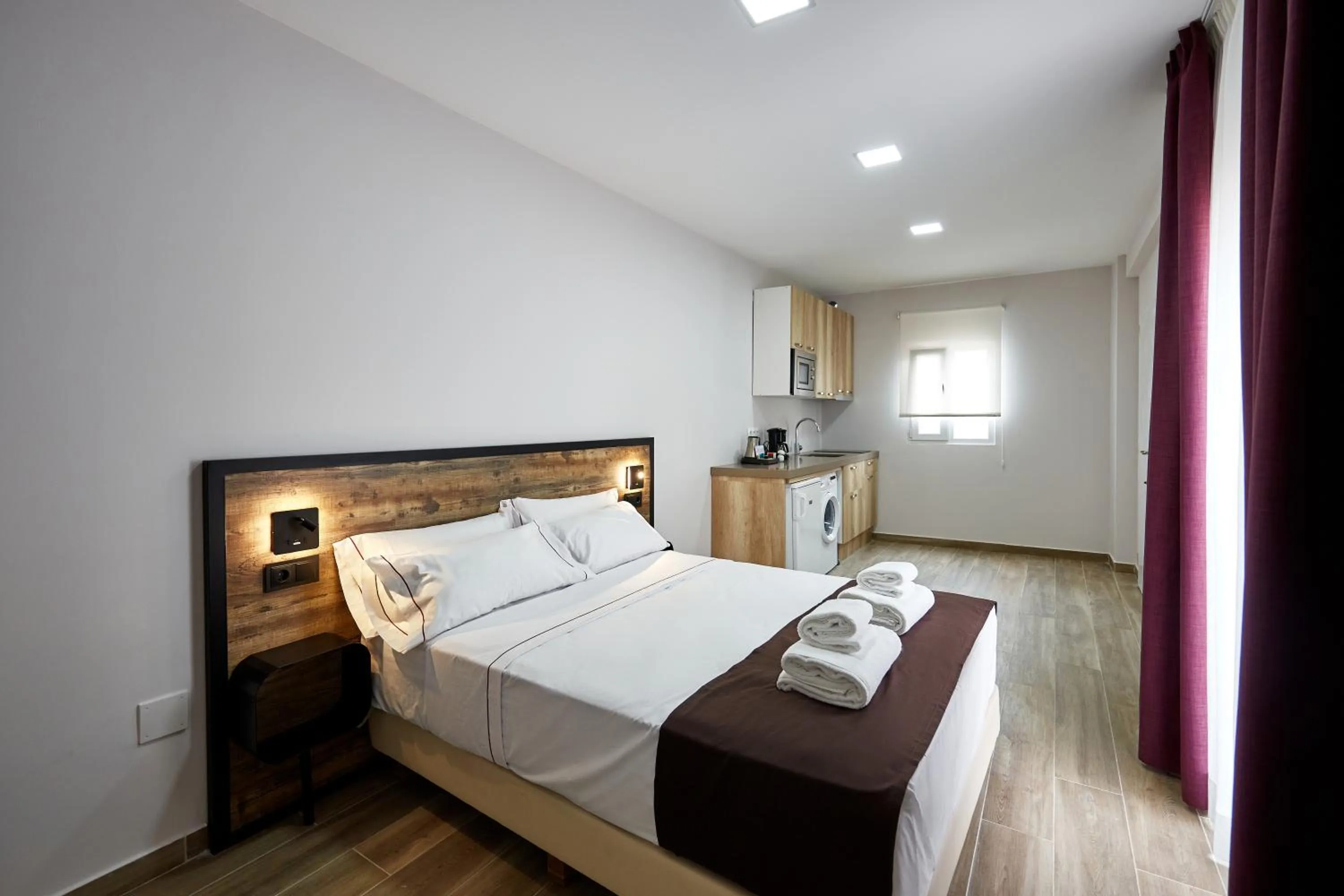 Seating area, Bed in GBH Hotel-Apartamentos Caballito de Mar