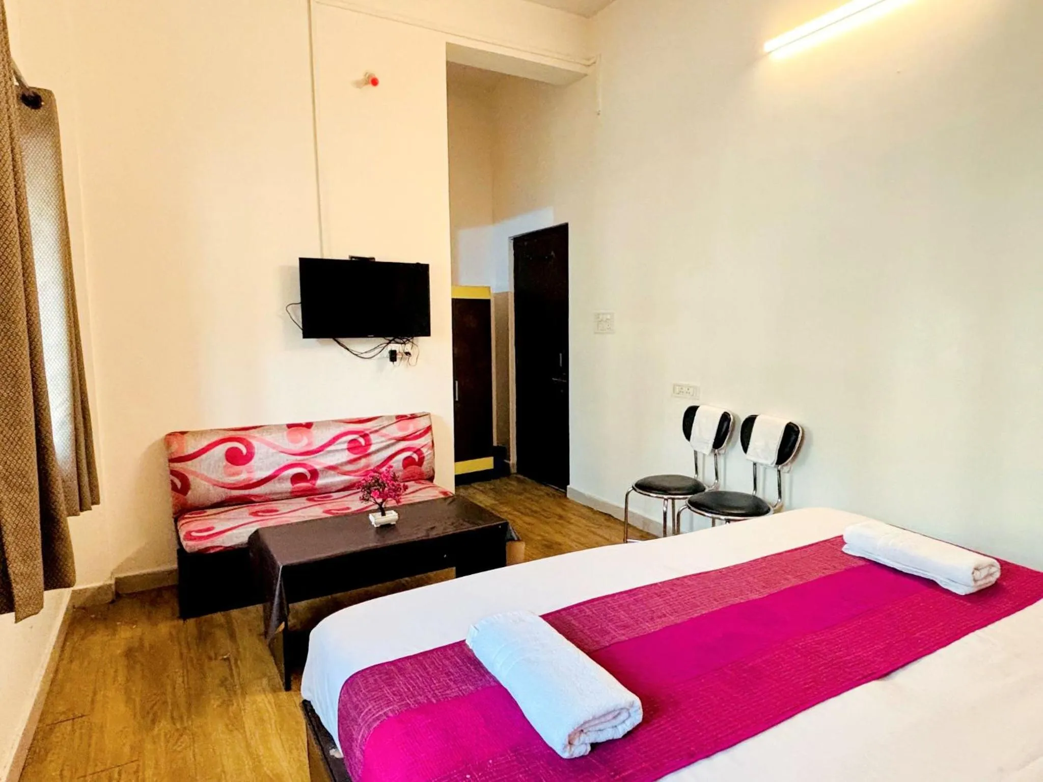 Bed in Hotel Sunrise Inn