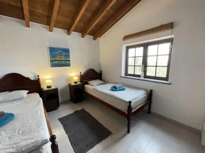 Bed in Da Silva Surfcamp- 2 Bettzimmer mit Frühstück