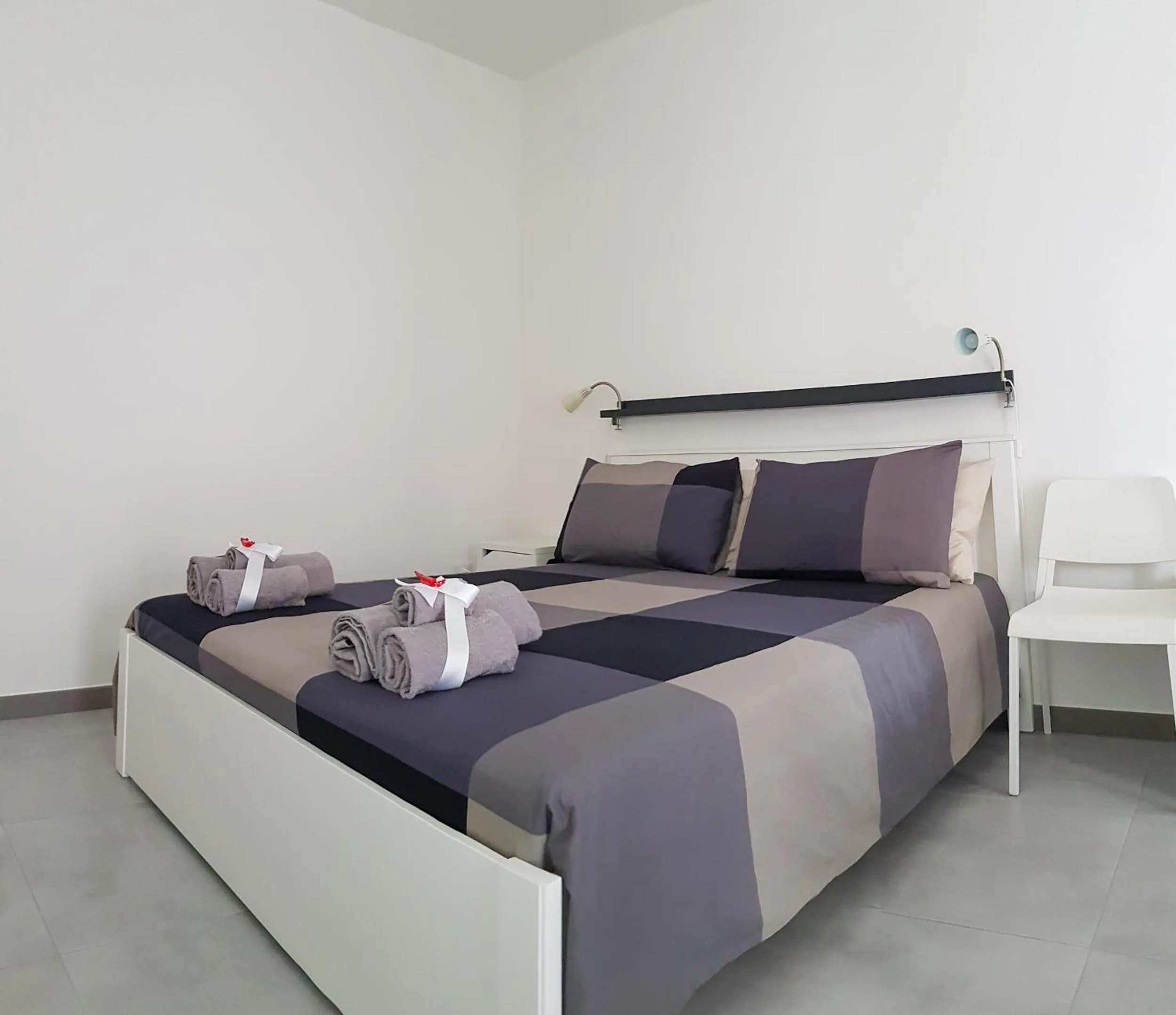 Bedroom, Bed in Punto Blu Relax
