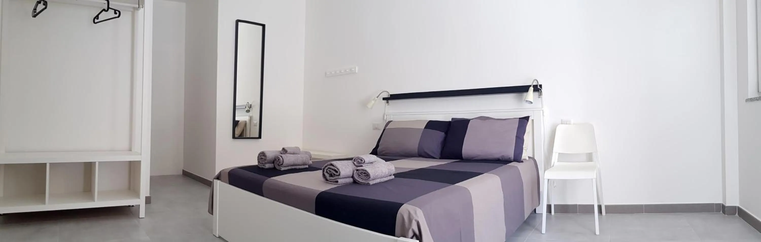 Bedroom, Bed in Punto Blu Relax