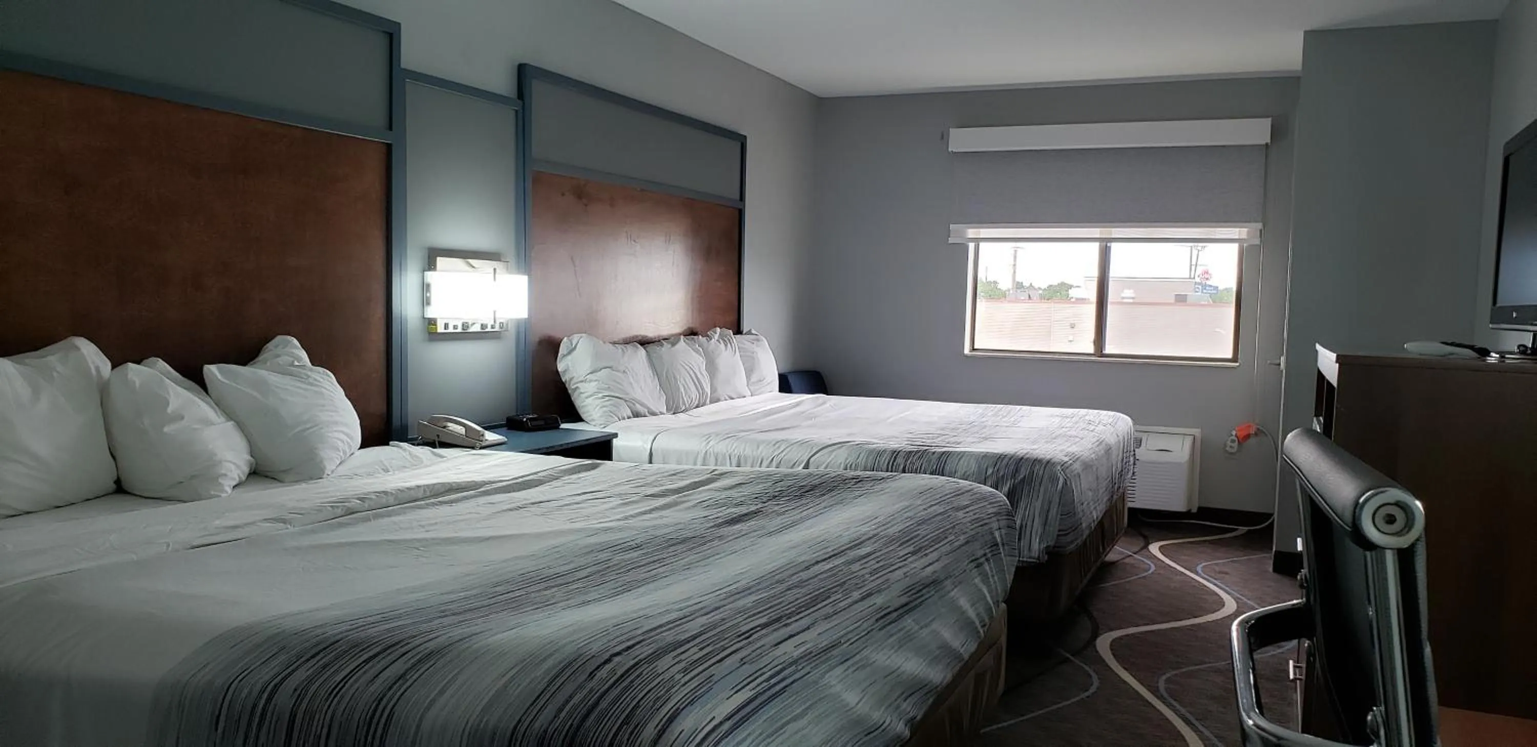 Photo of the whole room, Bed in AmericInn by Wyndham Mauston