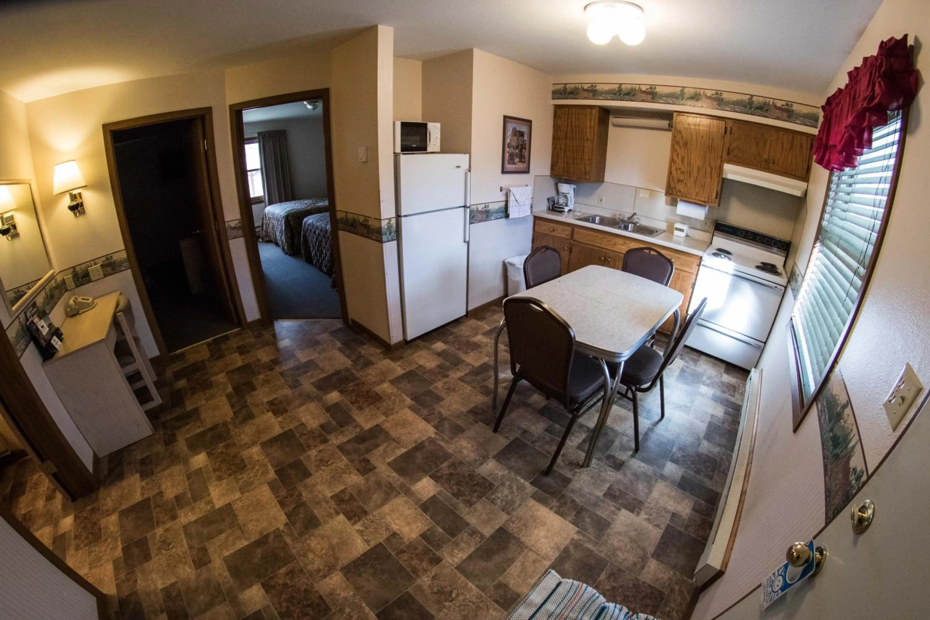 Kitchen or kitchenette in Stagecoach Inn & Suites