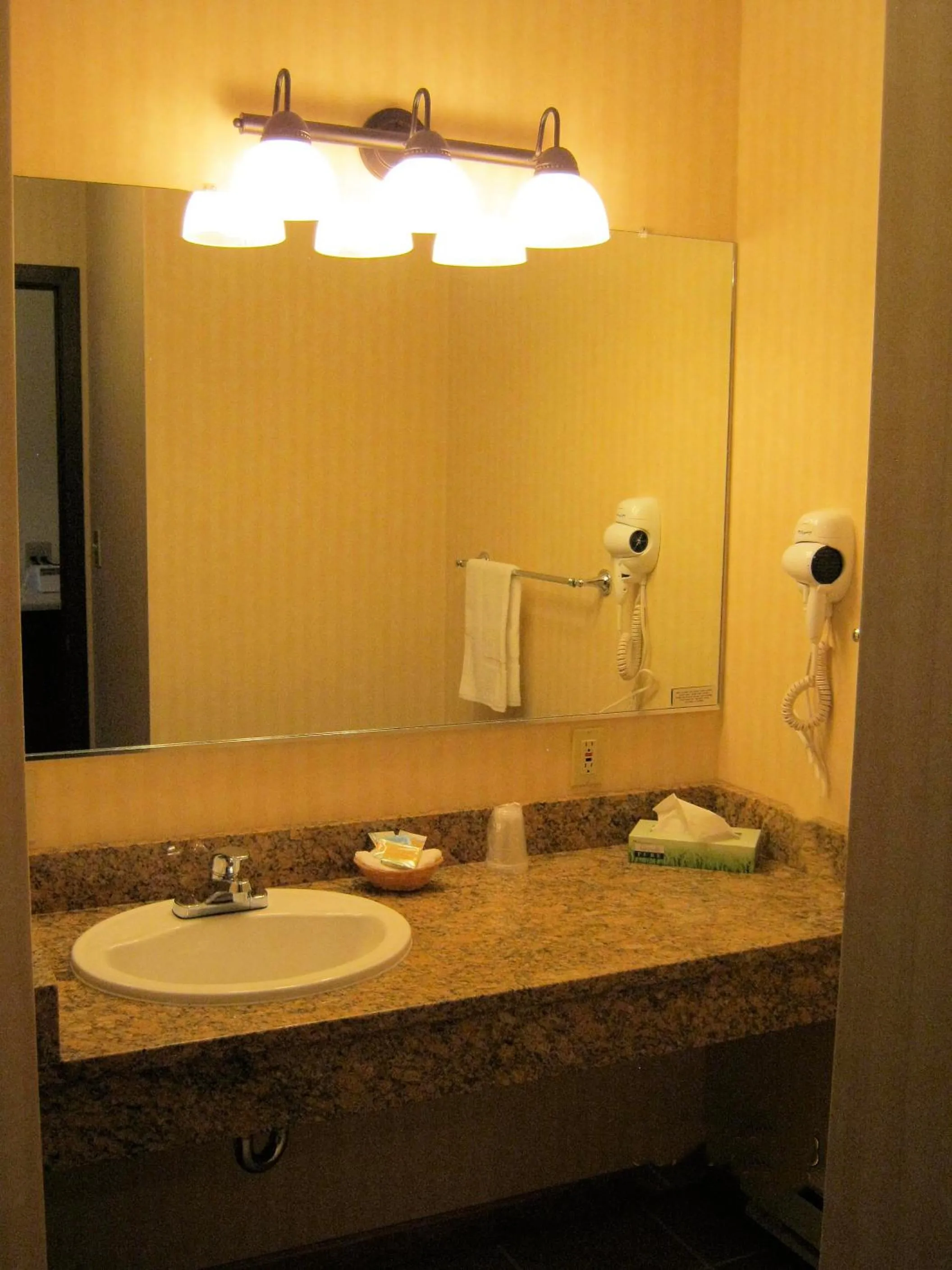 Bathroom in Stagecoach Inn & Suites