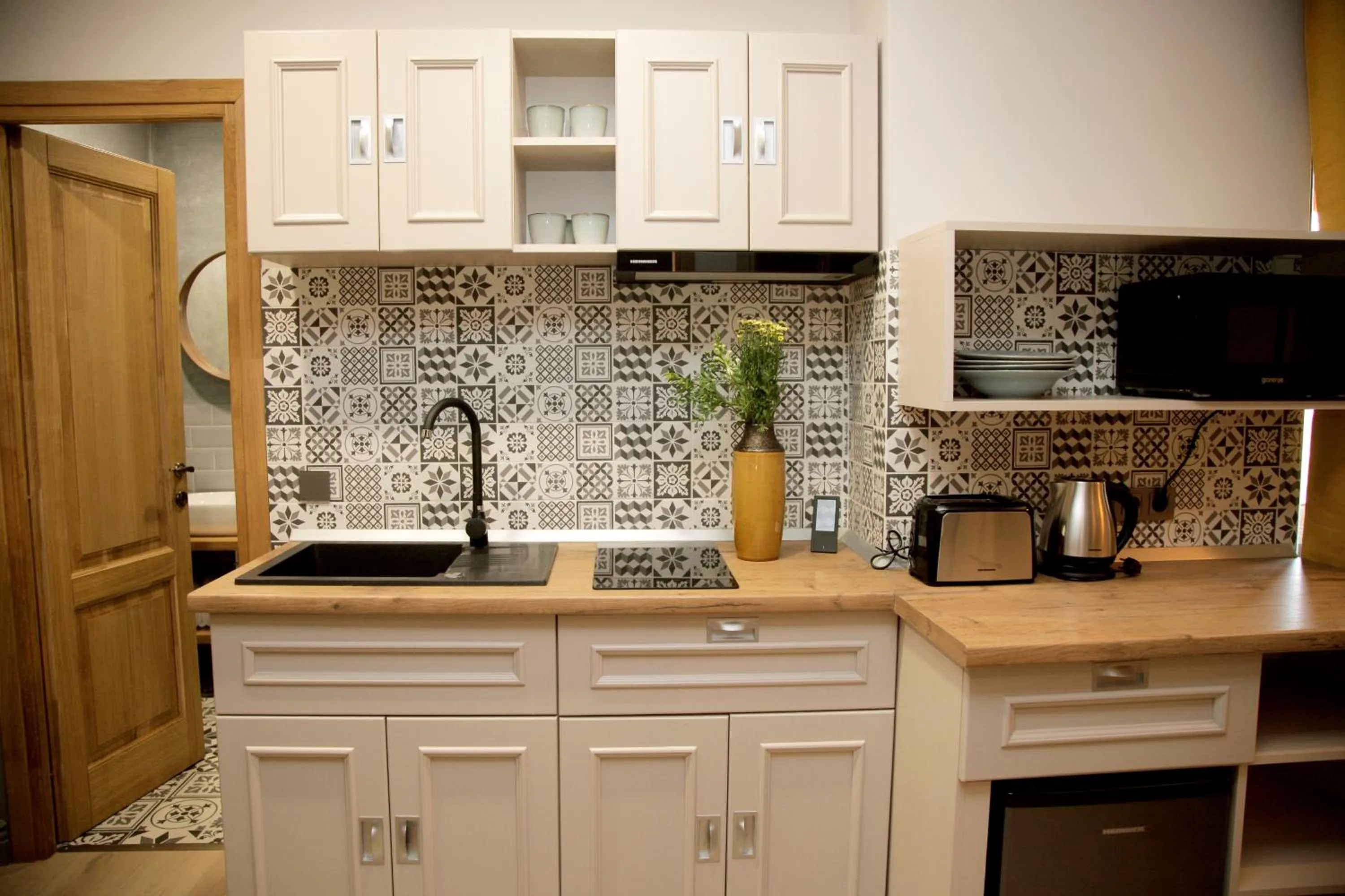 Kitchen or kitchenette in Central Boutique Apartments