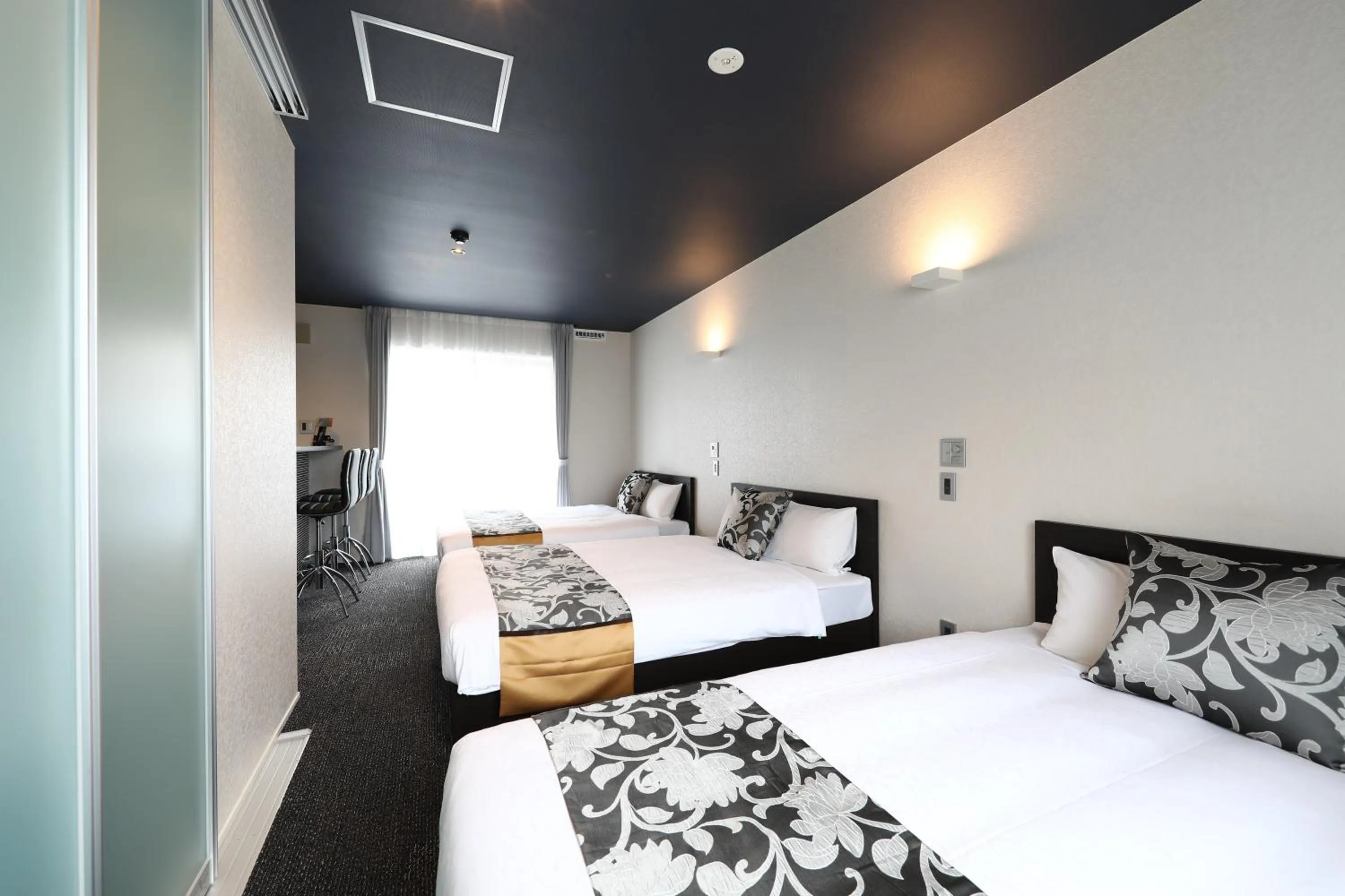 Bed in GRAND BASE Hakata City
