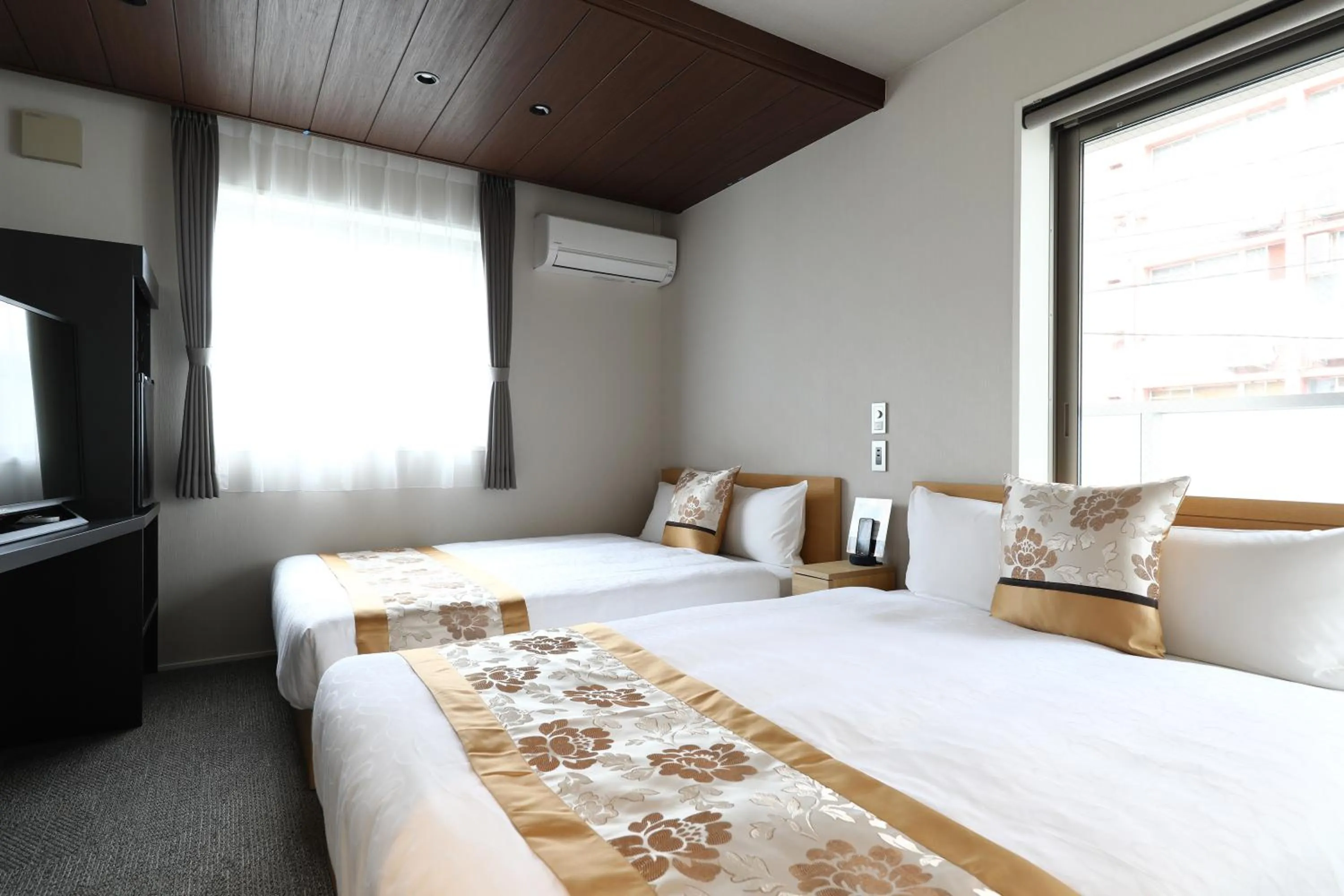 Bed in GRAND BASE Hakata City