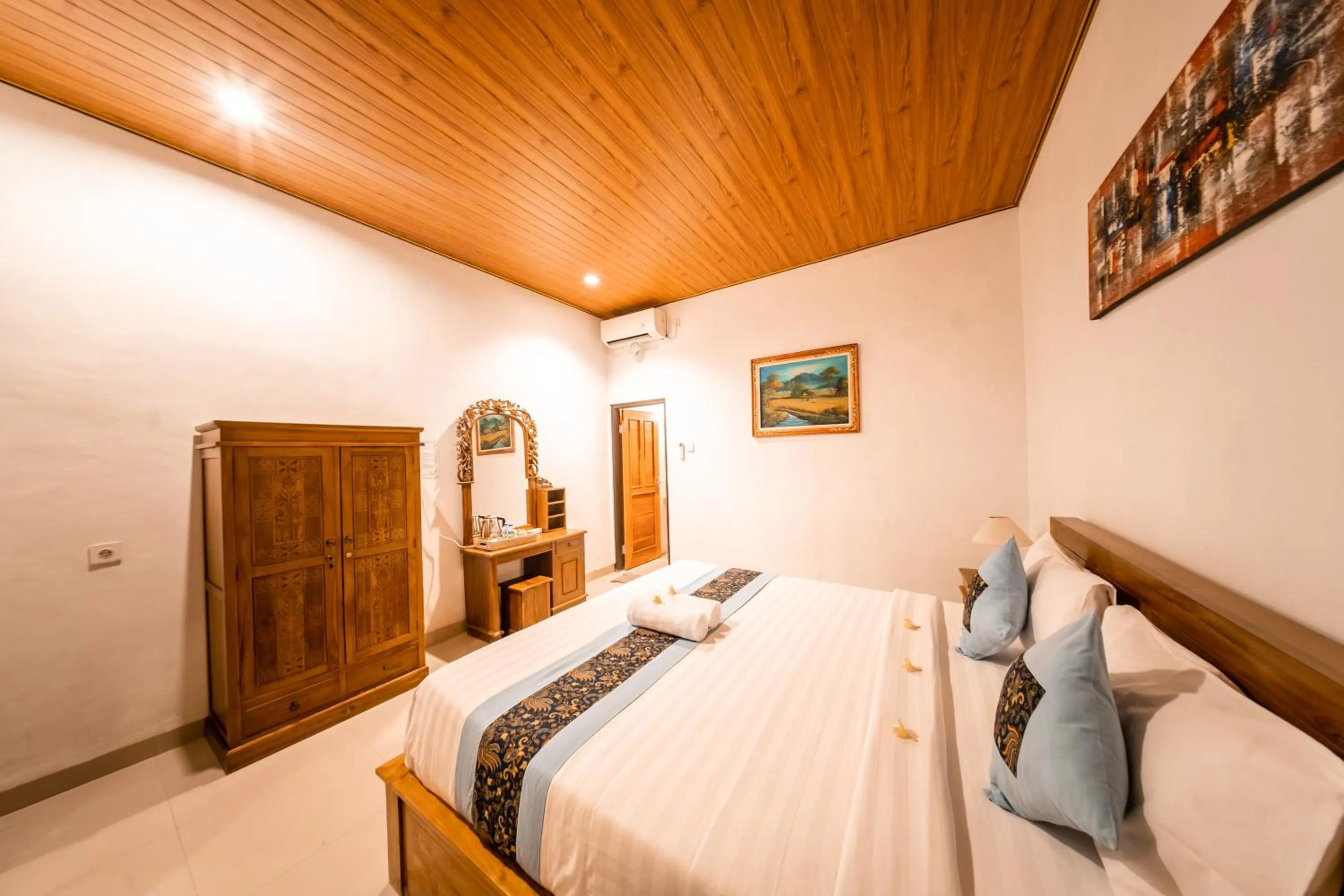 Bed in Surya Maha Bungallo