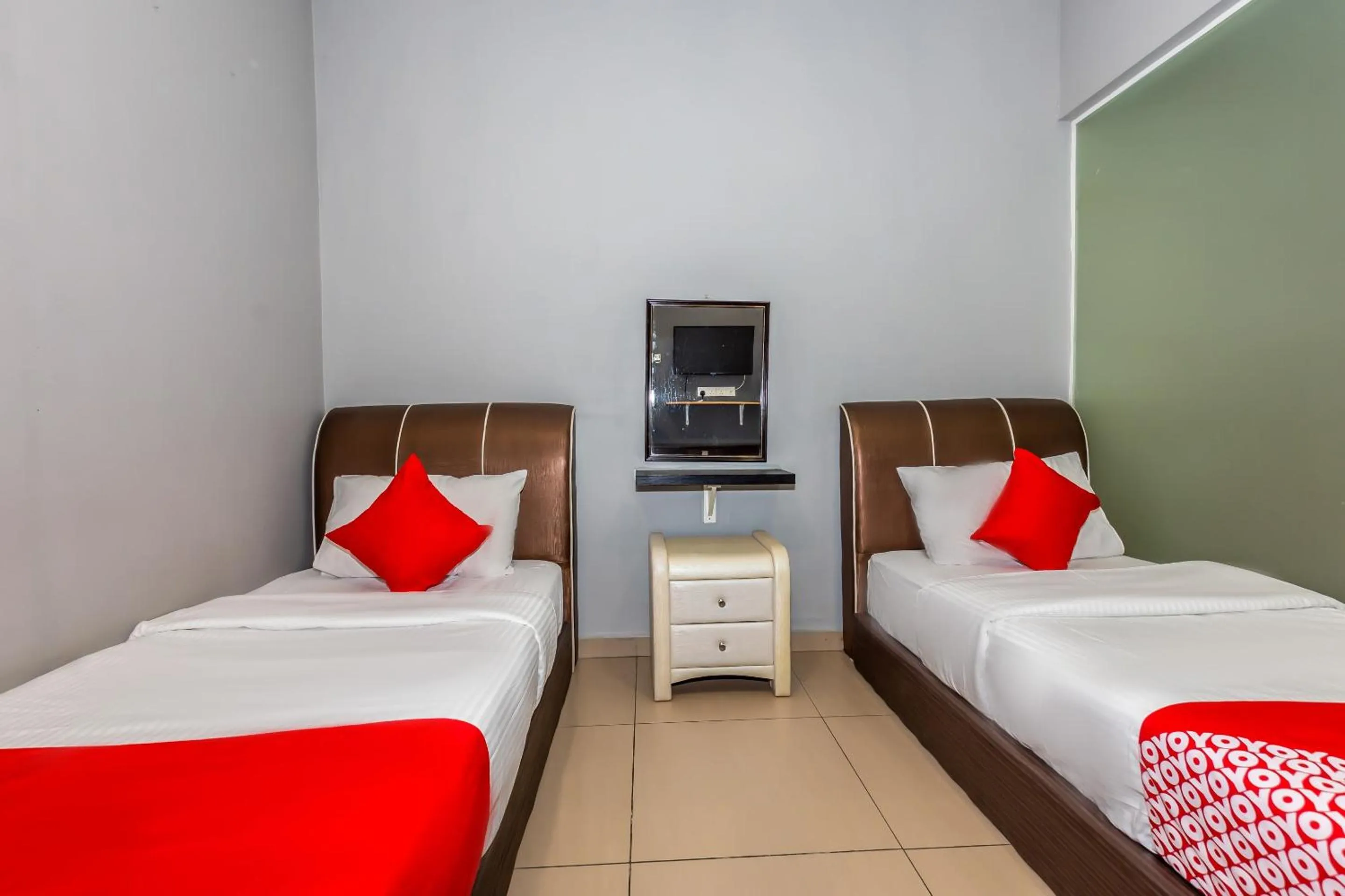 Bedroom in OYO 1185 Ho Hotel