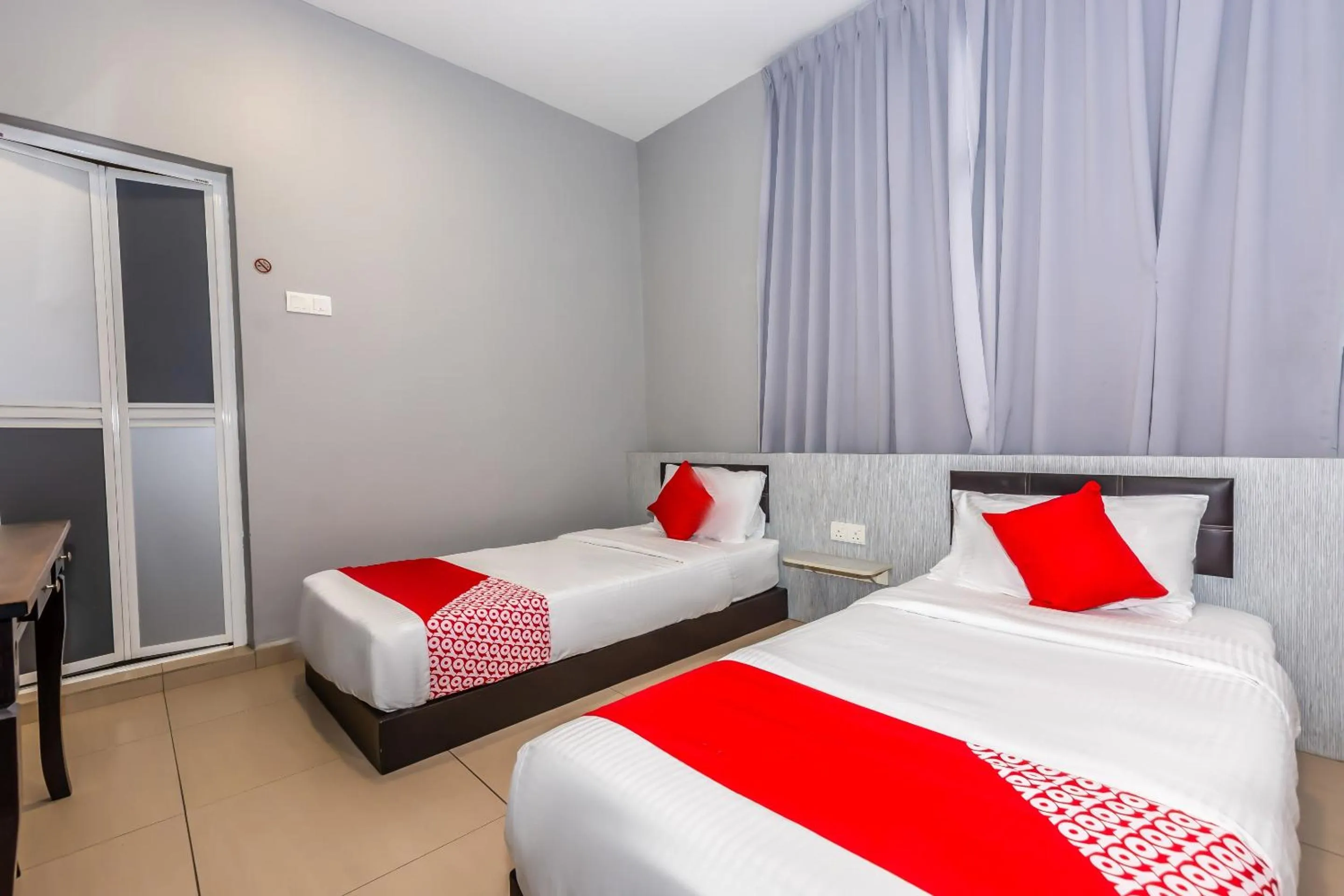 Bedroom in OYO 1185 Ho Hotel