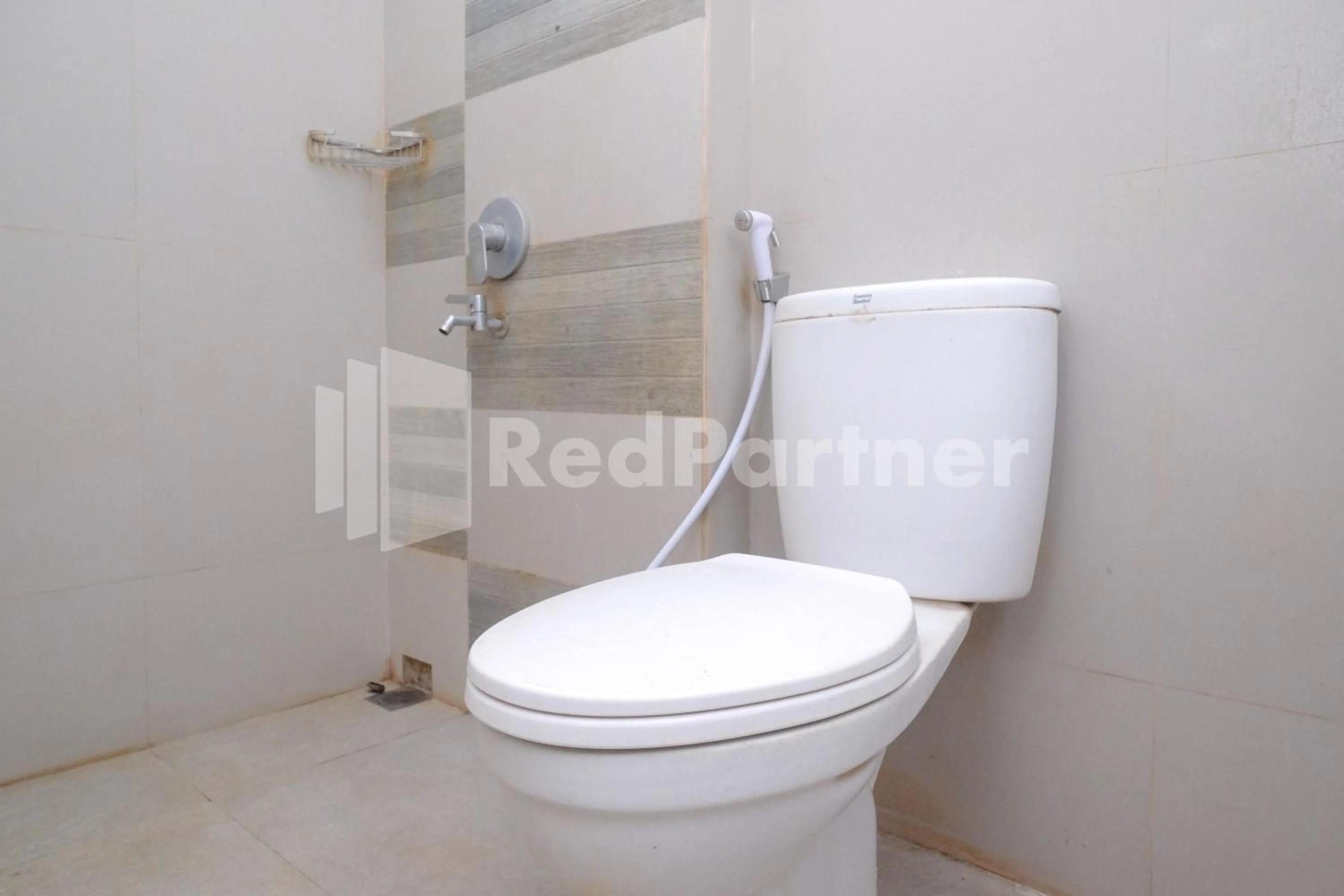 Bathroom in Garuda Guesthouse Yogyakarta RedPartner