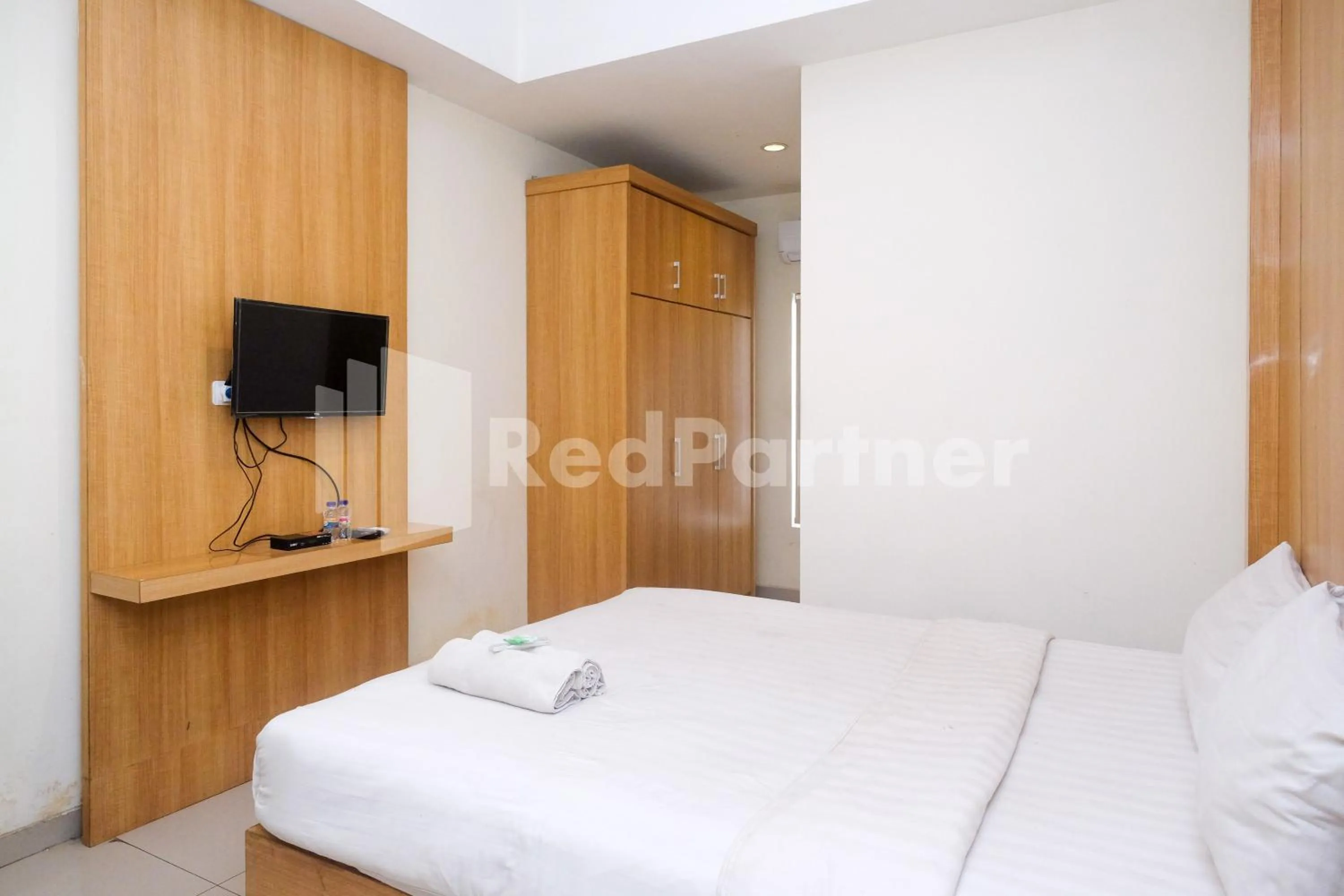 Bed in Garuda Guesthouse Yogyakarta RedPartner