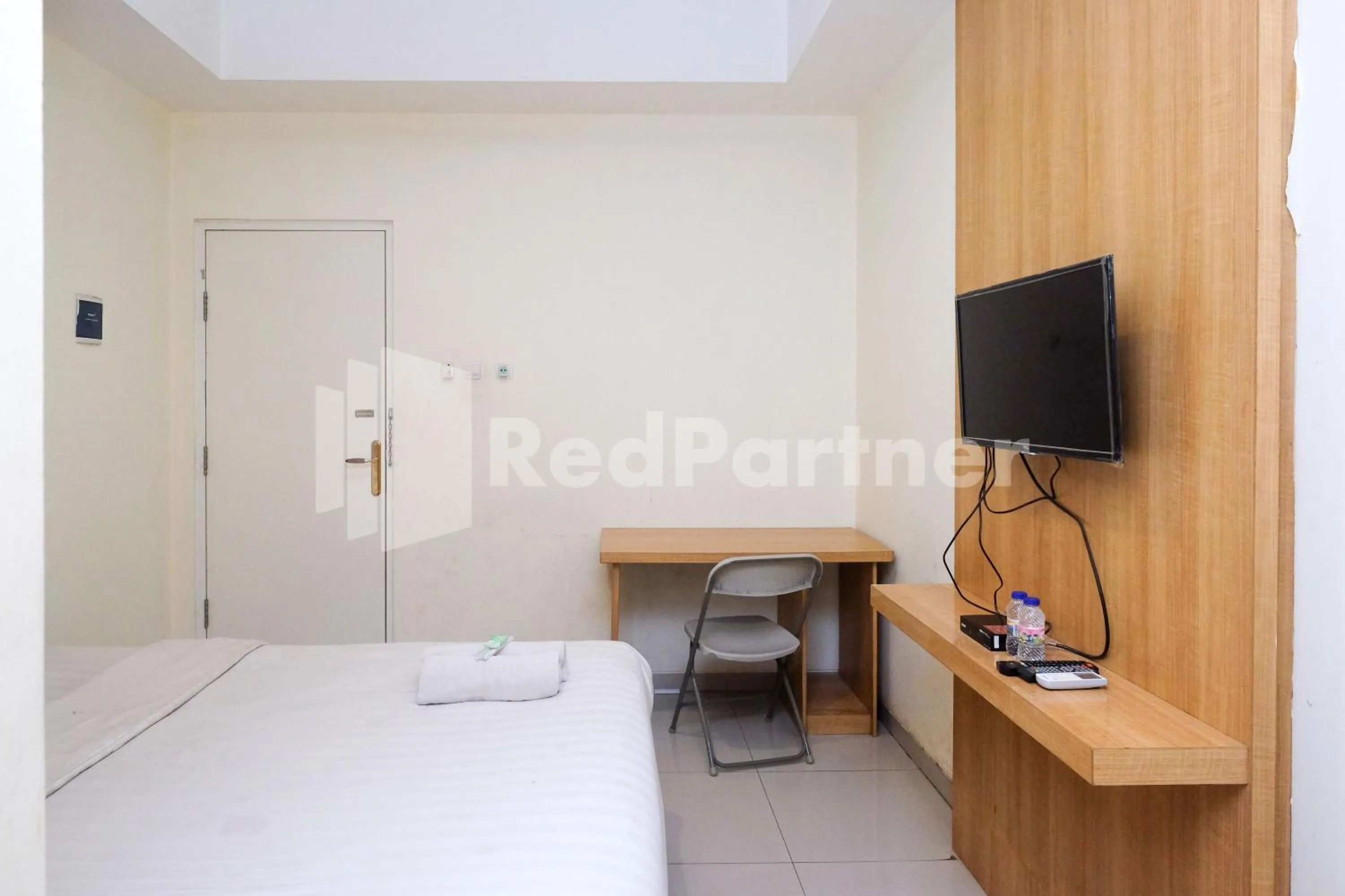 Bed in Garuda Guesthouse Yogyakarta RedPartner