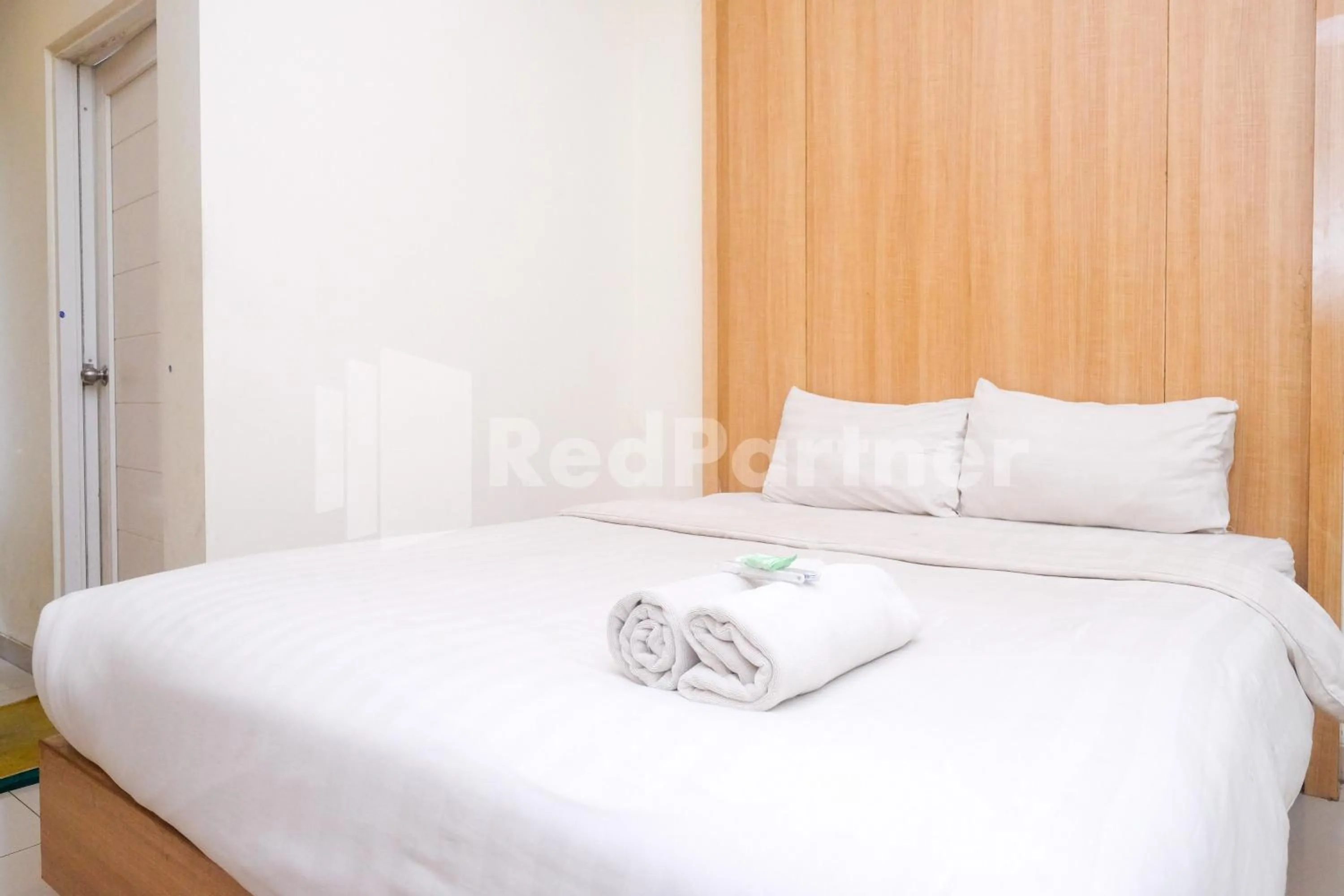 Bed in Garuda Guesthouse Yogyakarta RedPartner