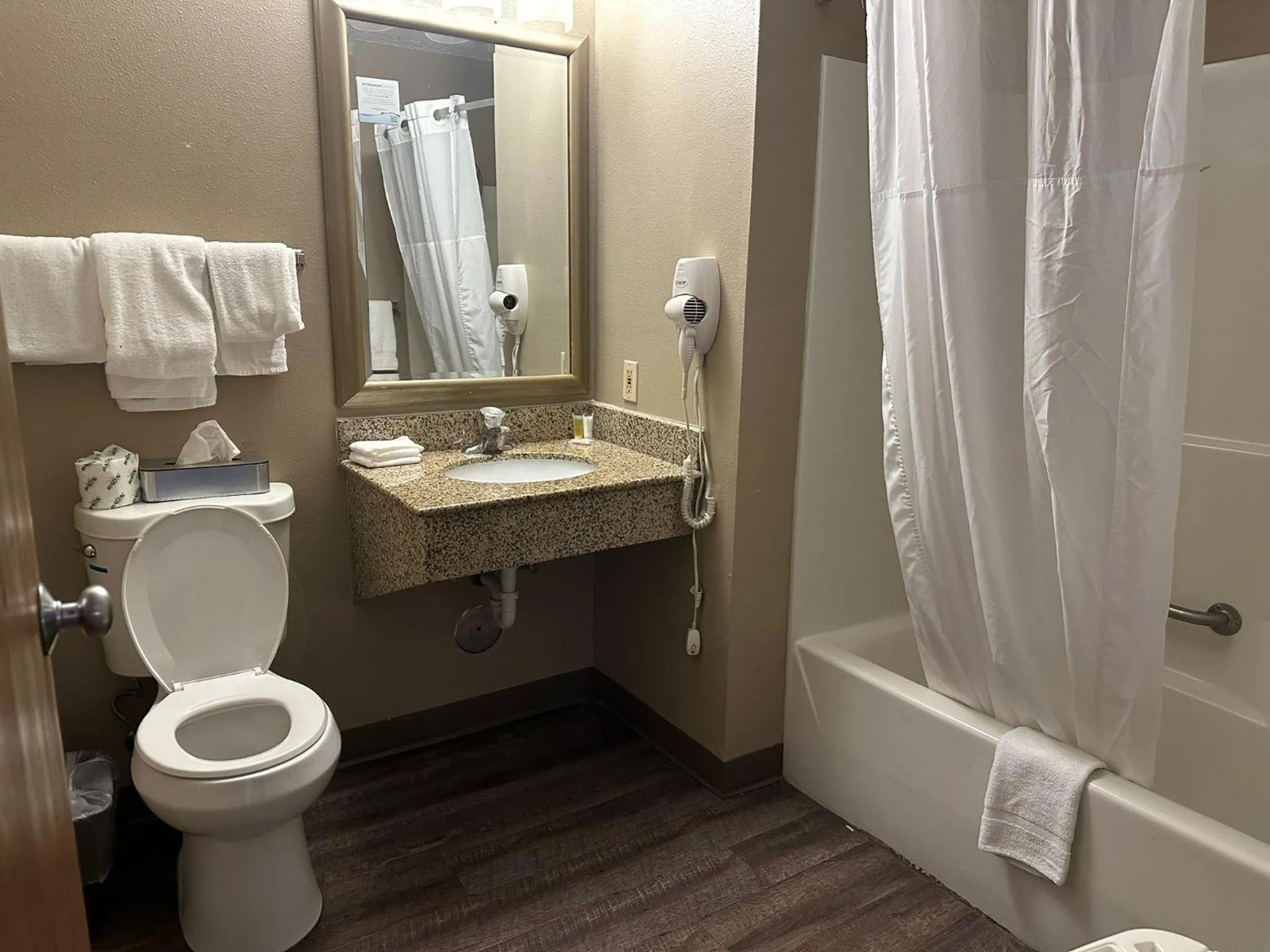 Toilet in Super 8 by Wyndham Sturtevant Racine