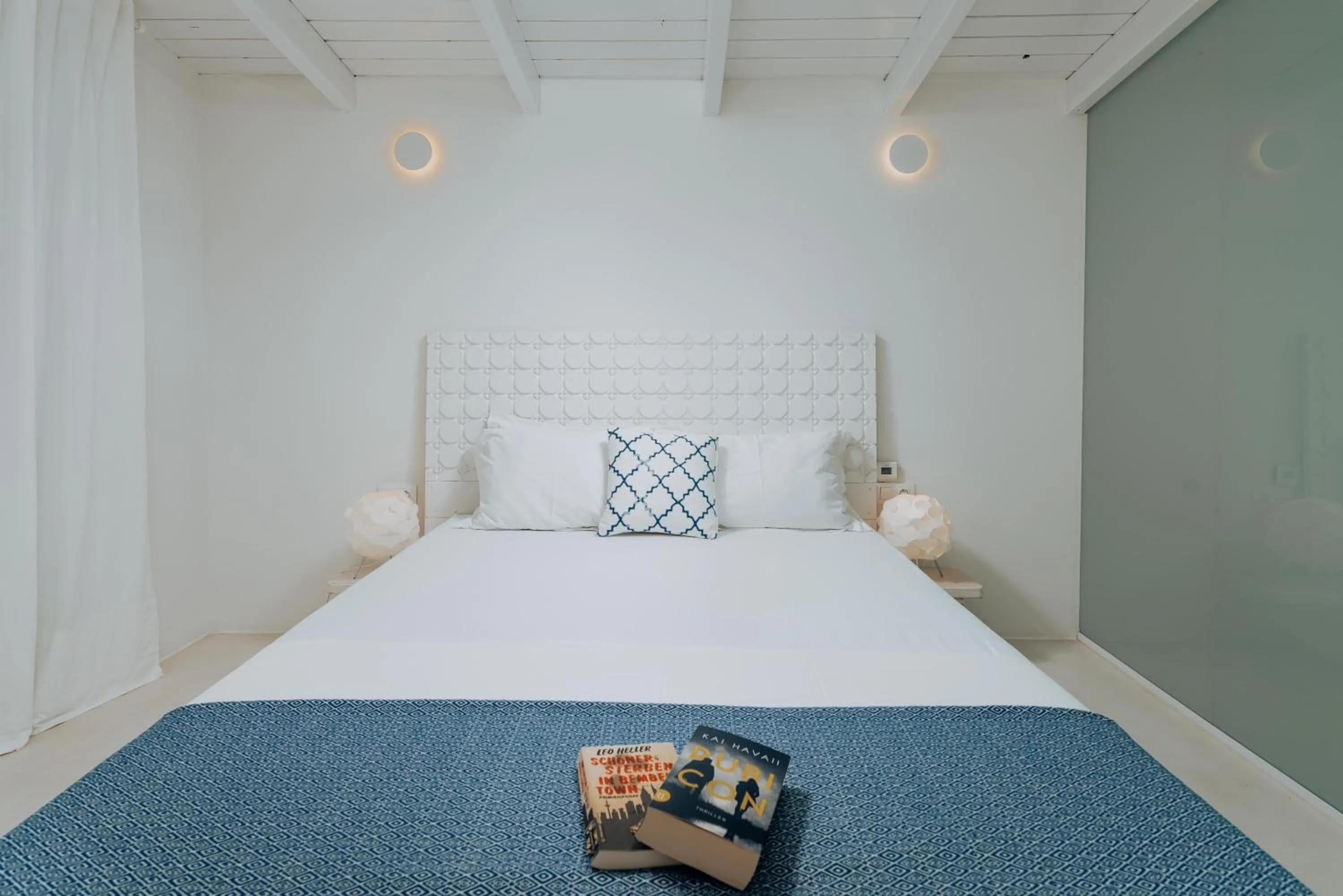 Bed in Die Zwei Brüder Art & Suites