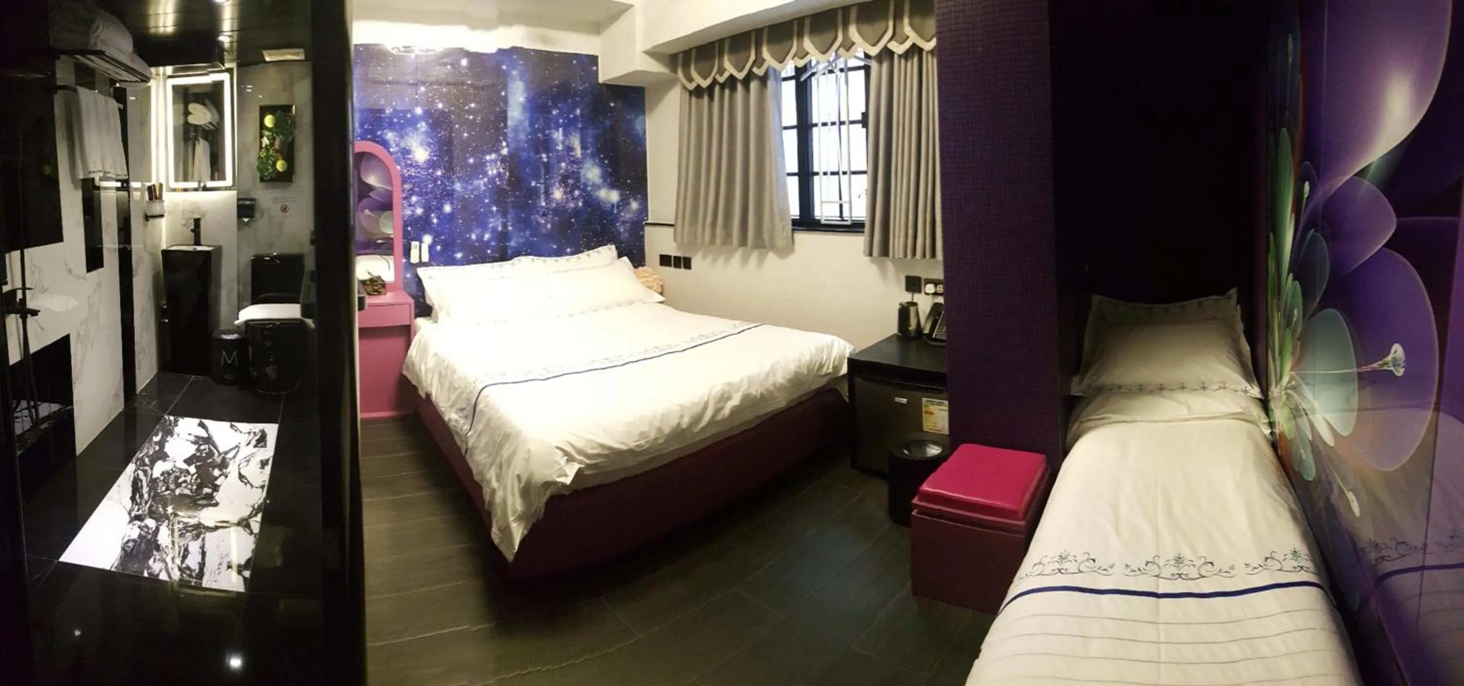 Bed in Star City Hotel