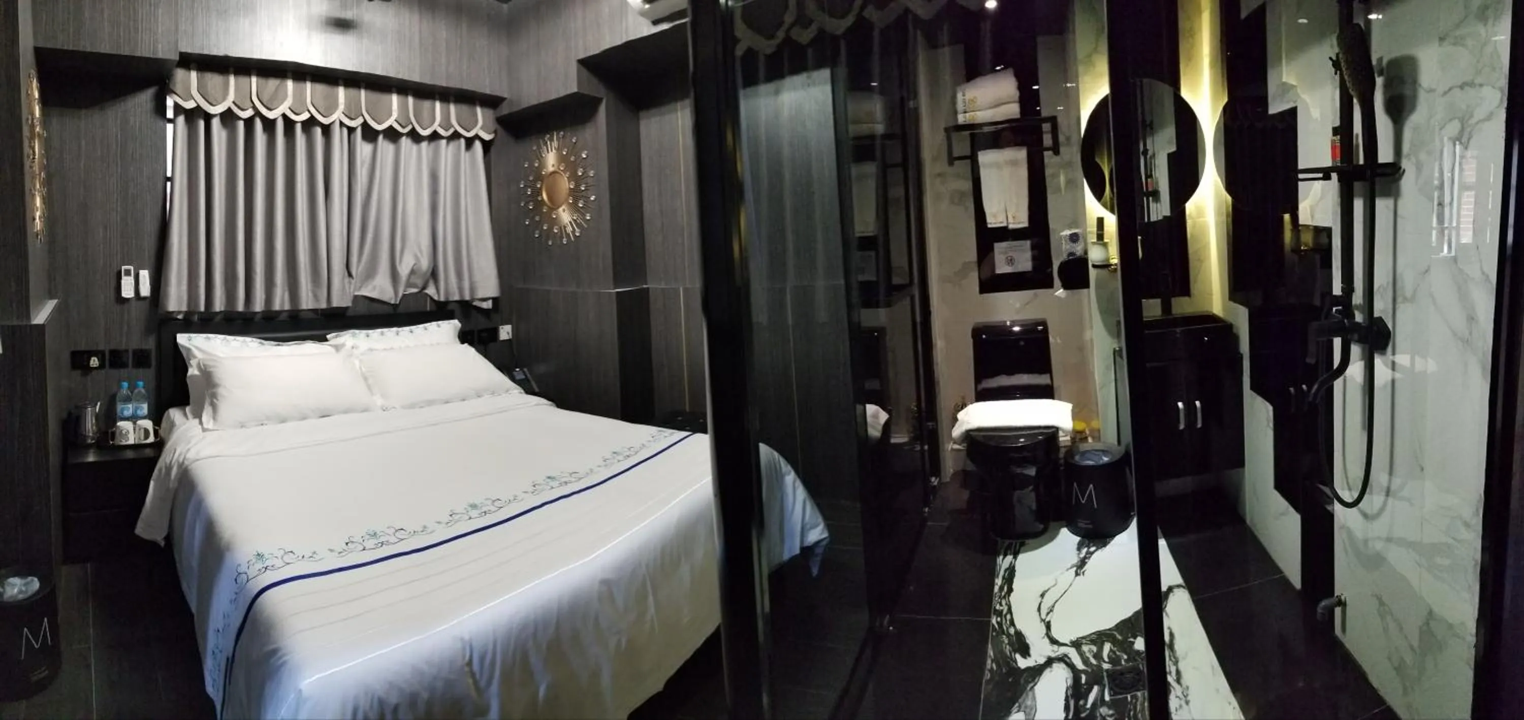 Bed in Star City Hotel