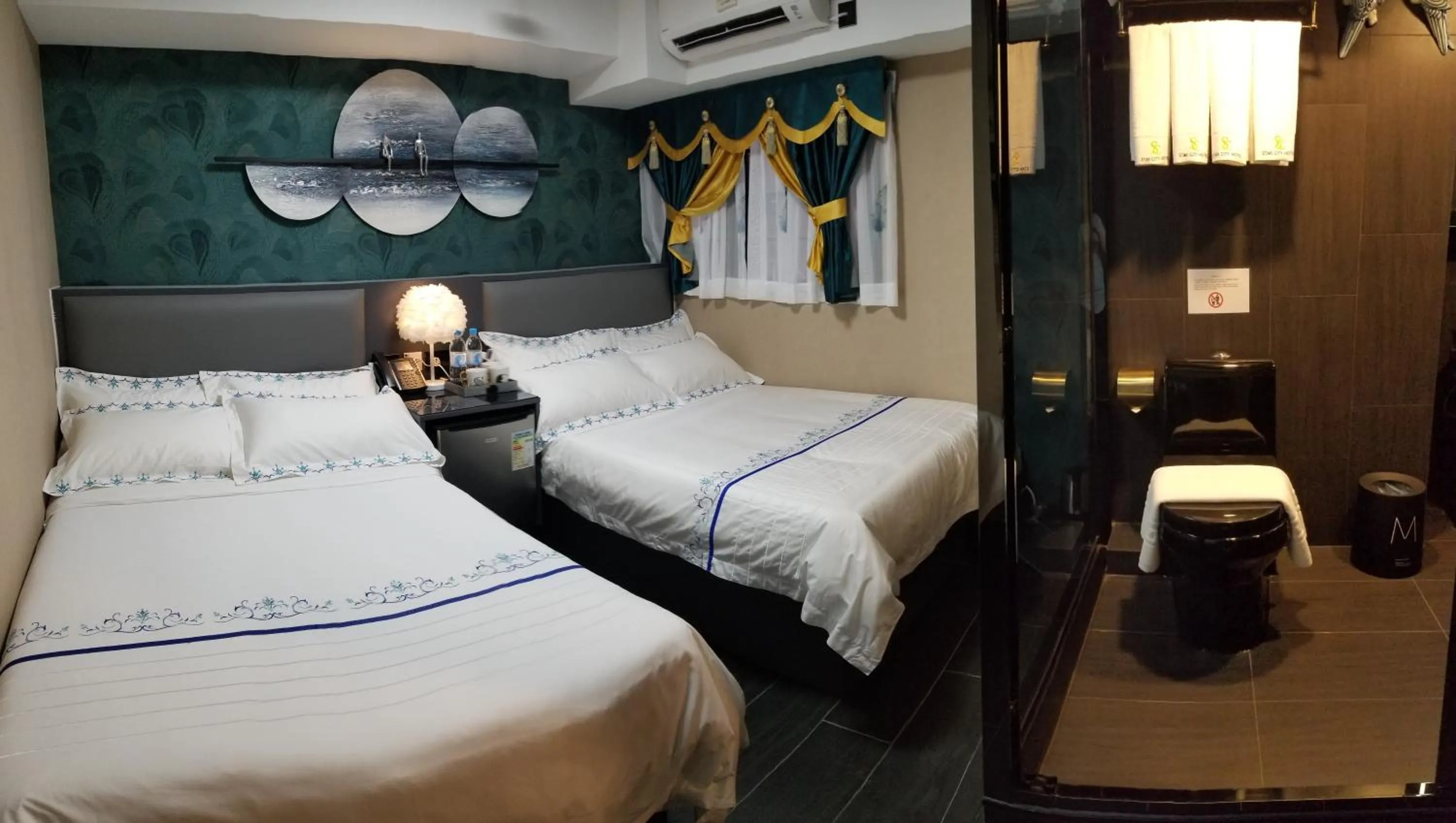 Bed in Star City Hotel