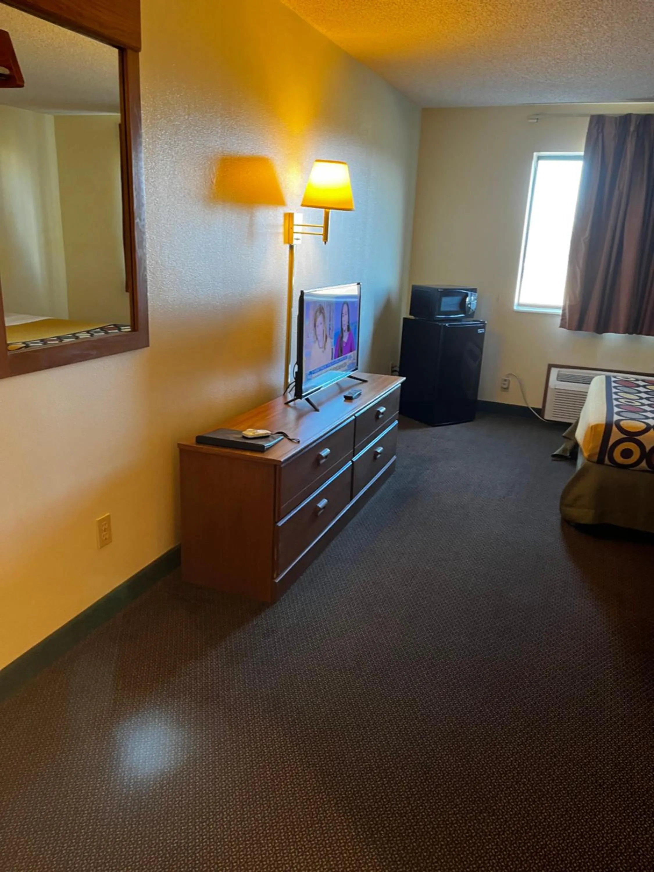 Bed in Super 8 by Wyndham Smithville Kansas City