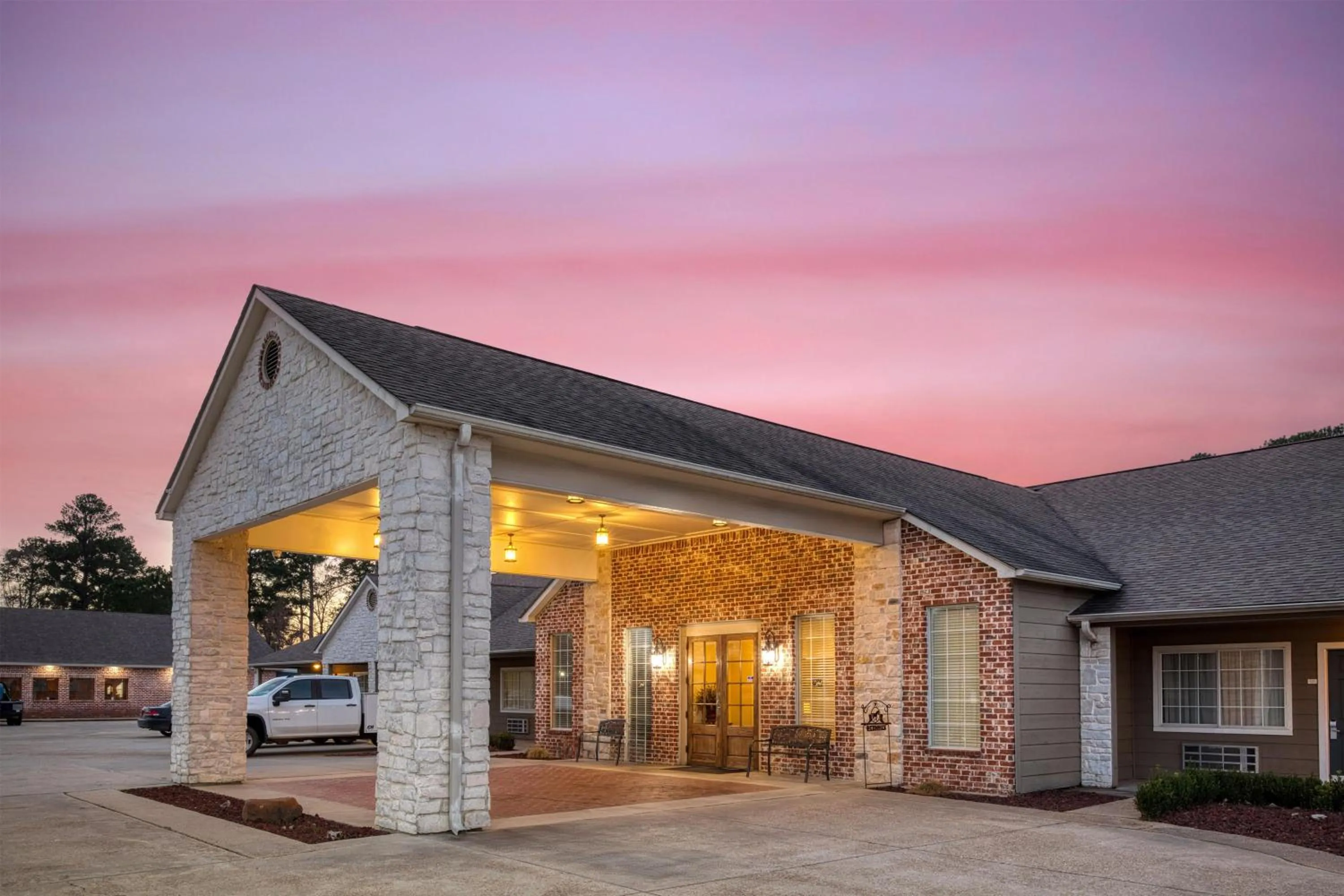 Property building in SureStay Hotel by Best Western Leesville