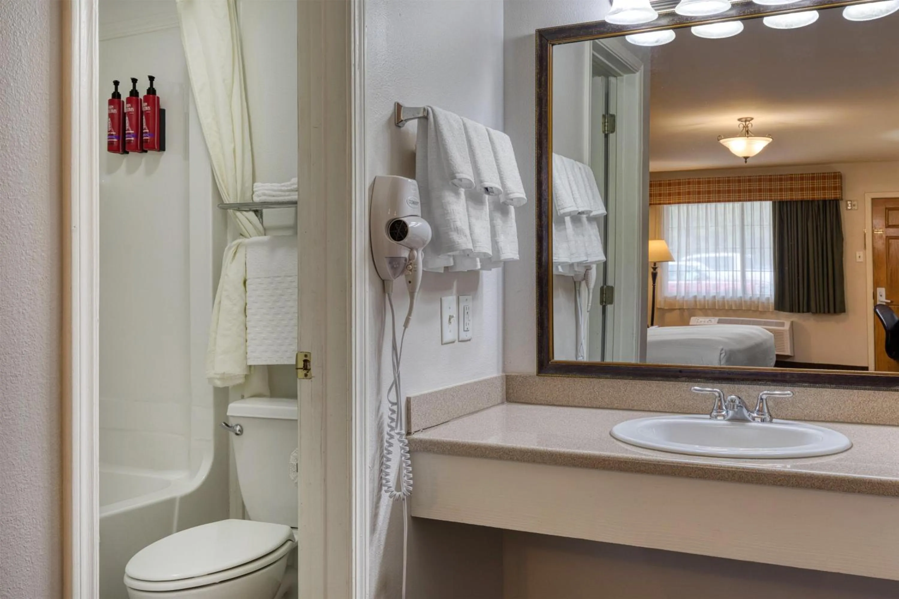 Bathroom in SureStay Hotel by Best Western Leesville