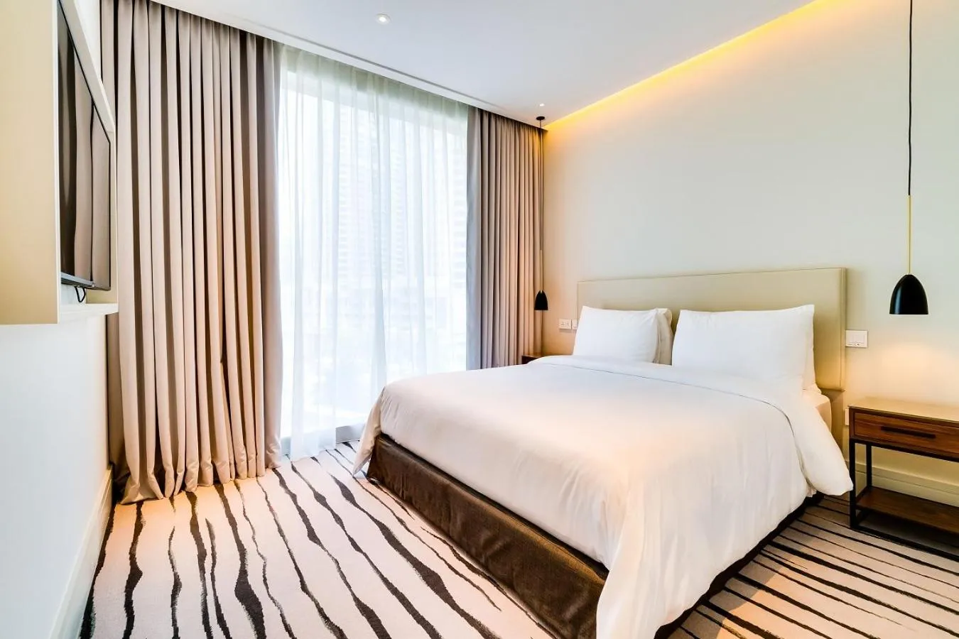Bed in Vida Downtown Residences