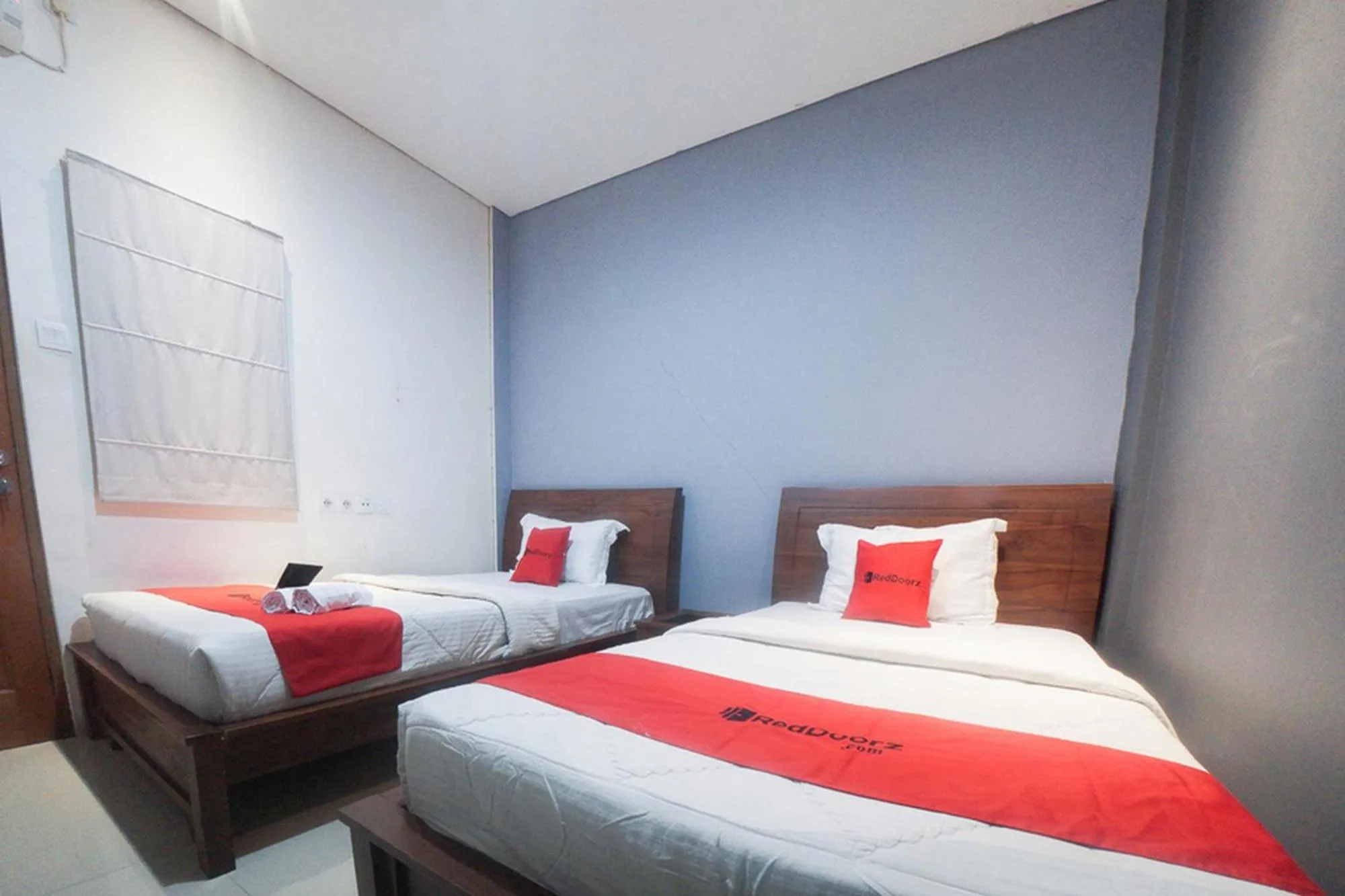 Bedroom, Bed in RedDoorz Plus near Green Pramuka Square Mall