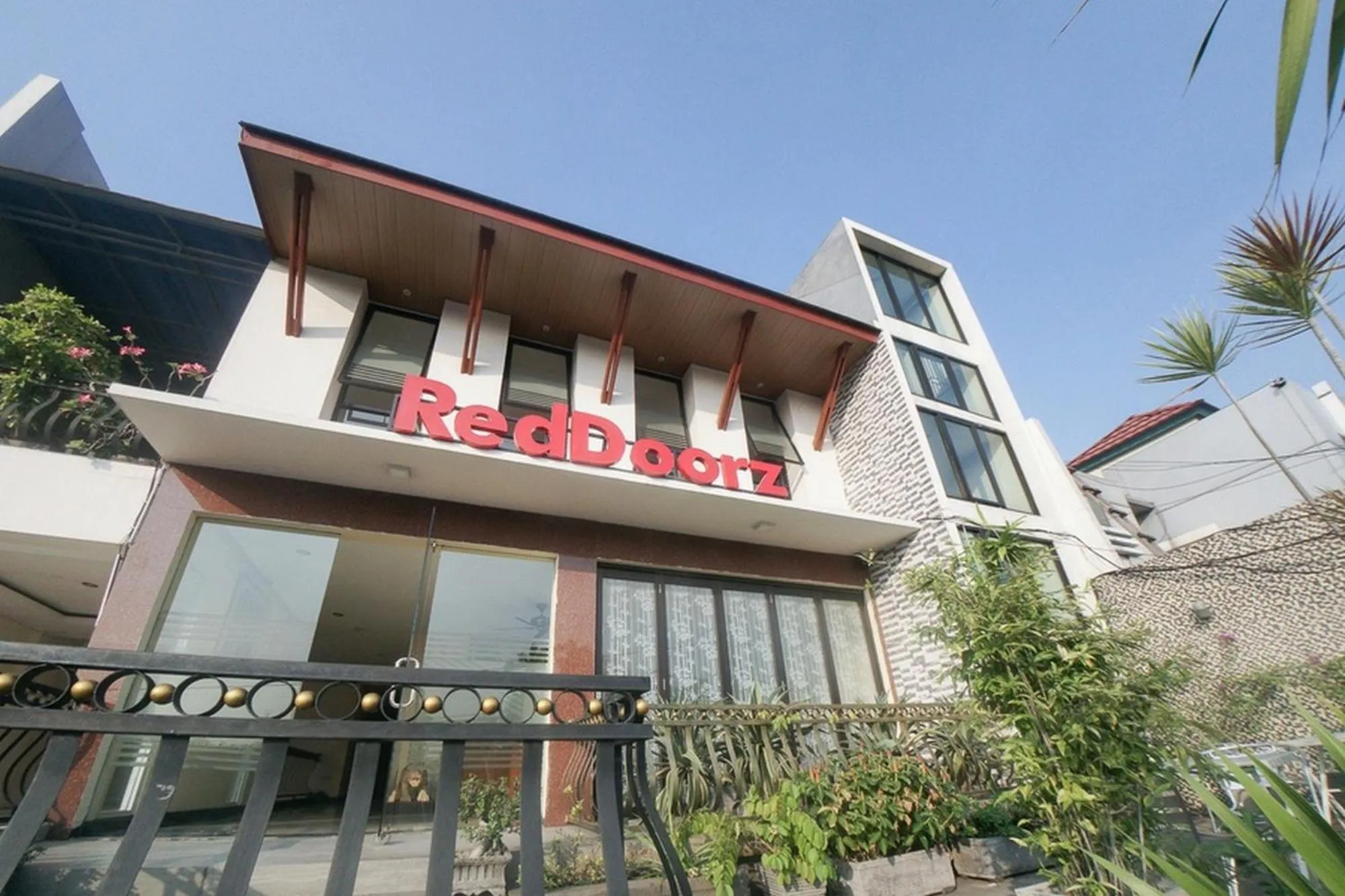 Property logo or sign in RedDoorz Plus near Green Pramuka Square Mall