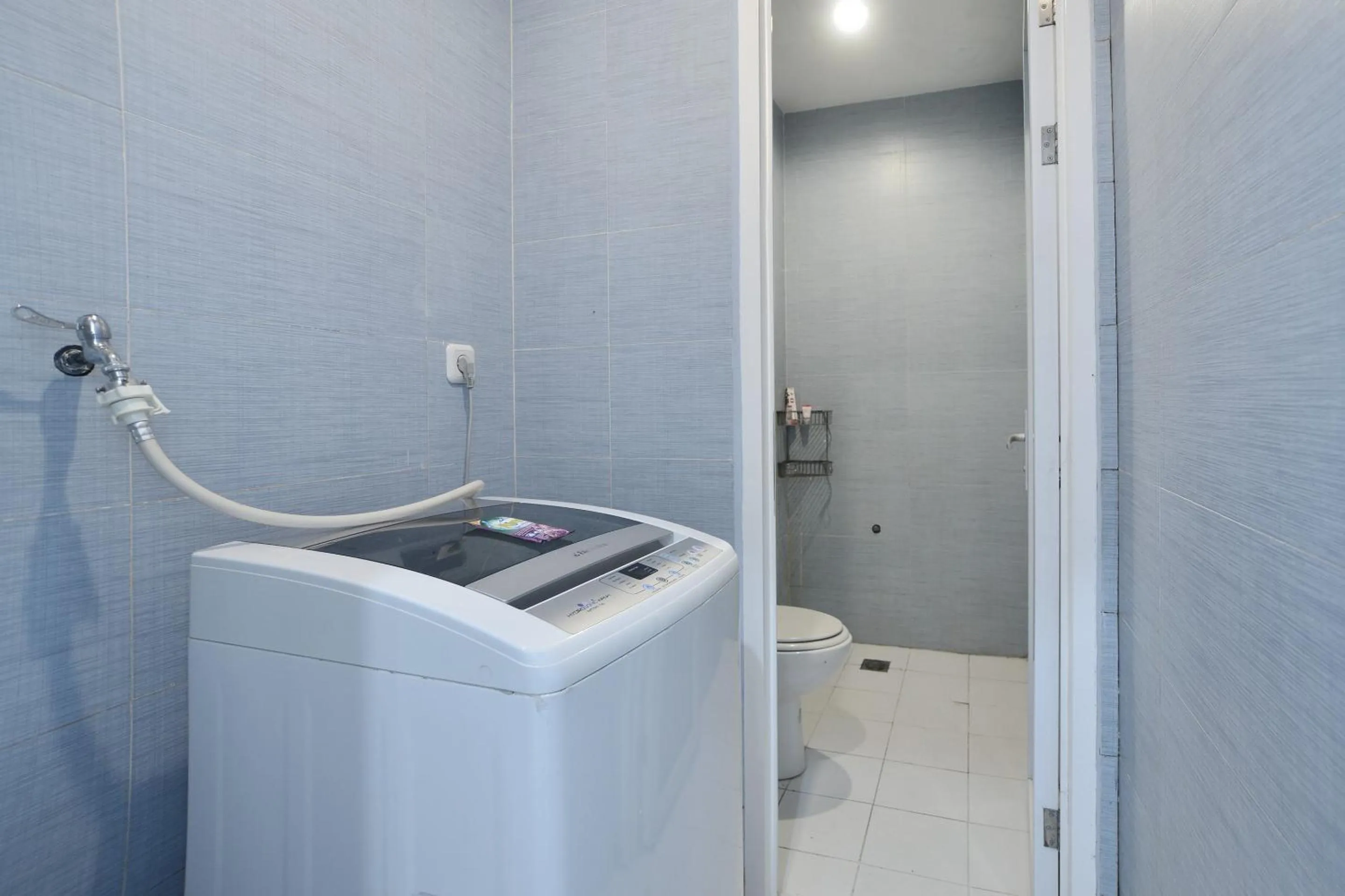 Bathroom in Hotel O Appartel Cempaka