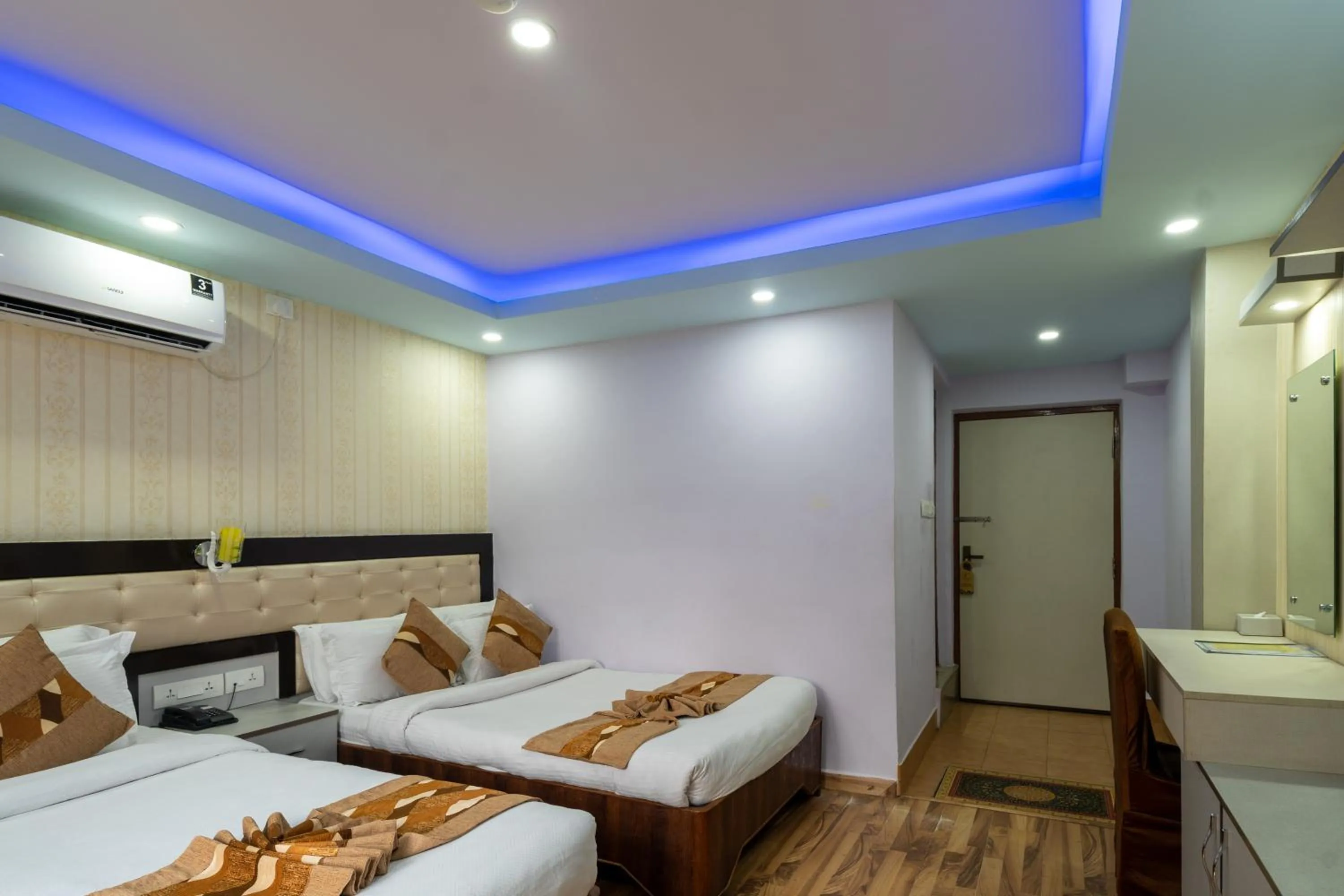 Bed in Avocado Orchid Resort