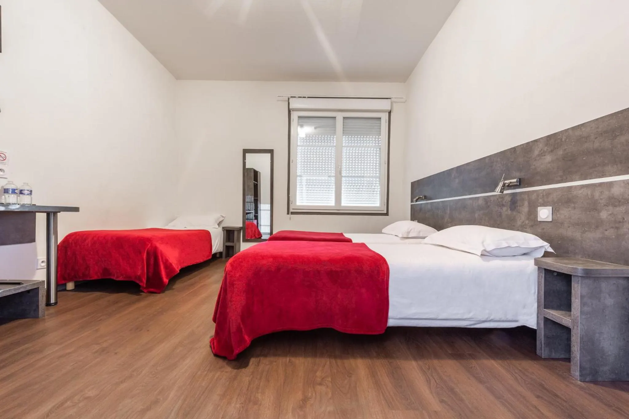 Bed in Hôtel de la Gare