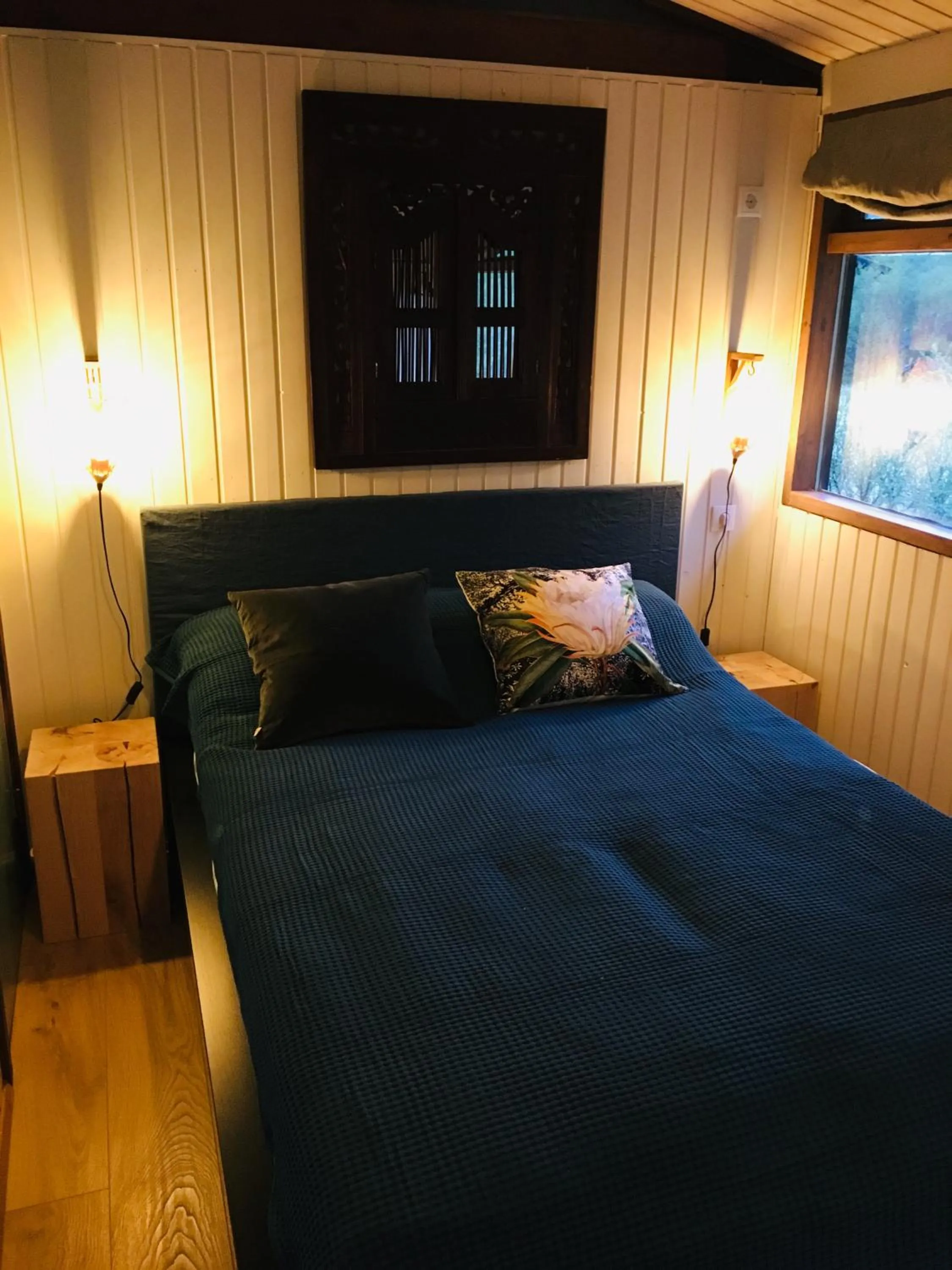 Bed in Mulakot Cosy Cabins