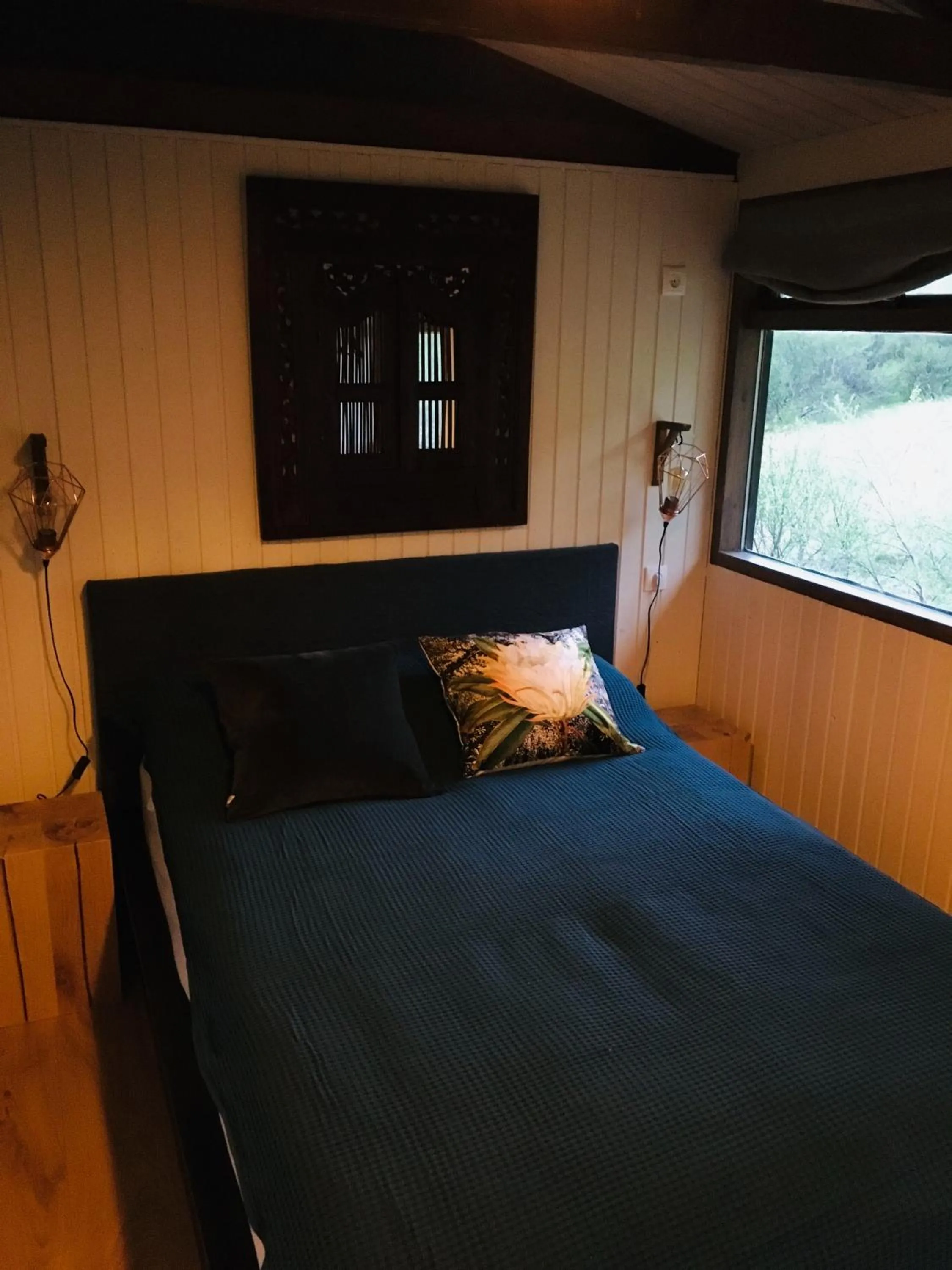 Bed in Mulakot Cosy Cabins