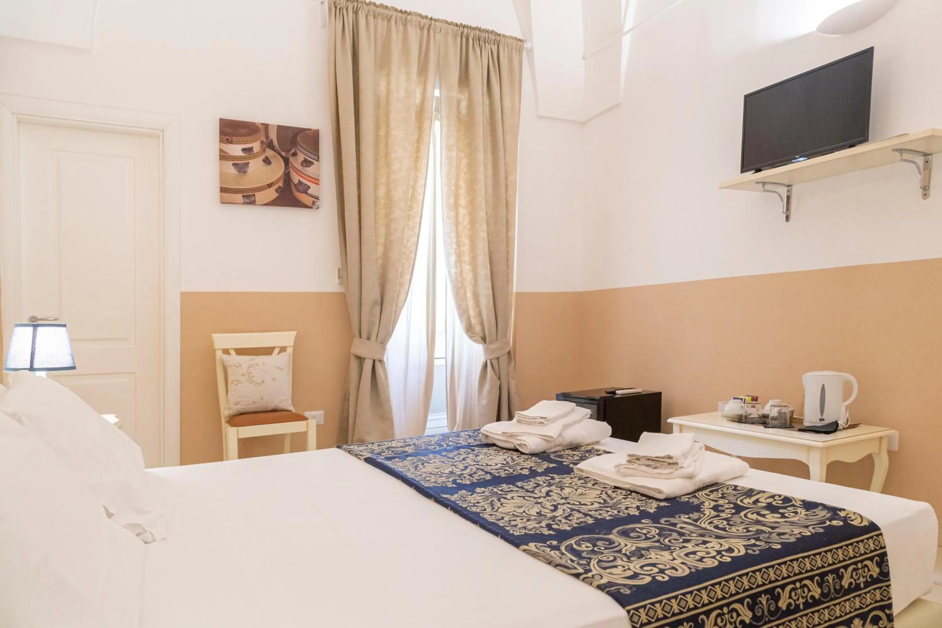 TV and multimedia, Bed in Casa Mamma Elvira