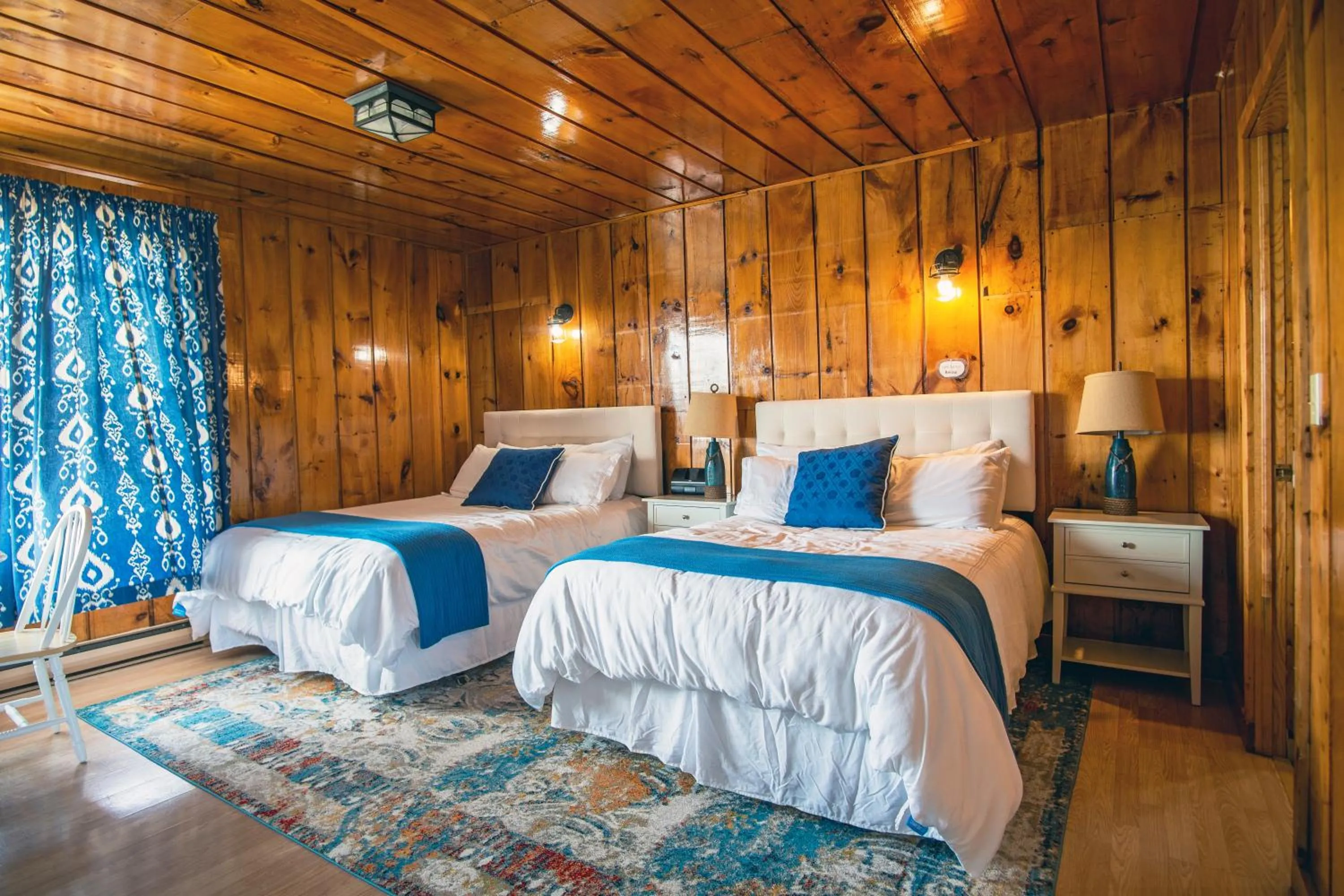 Bed in Friars Bay Inn & Cottages