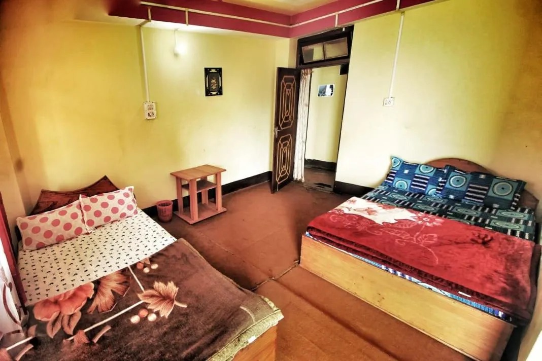 Bed in Shraddha Homestay - Aritar