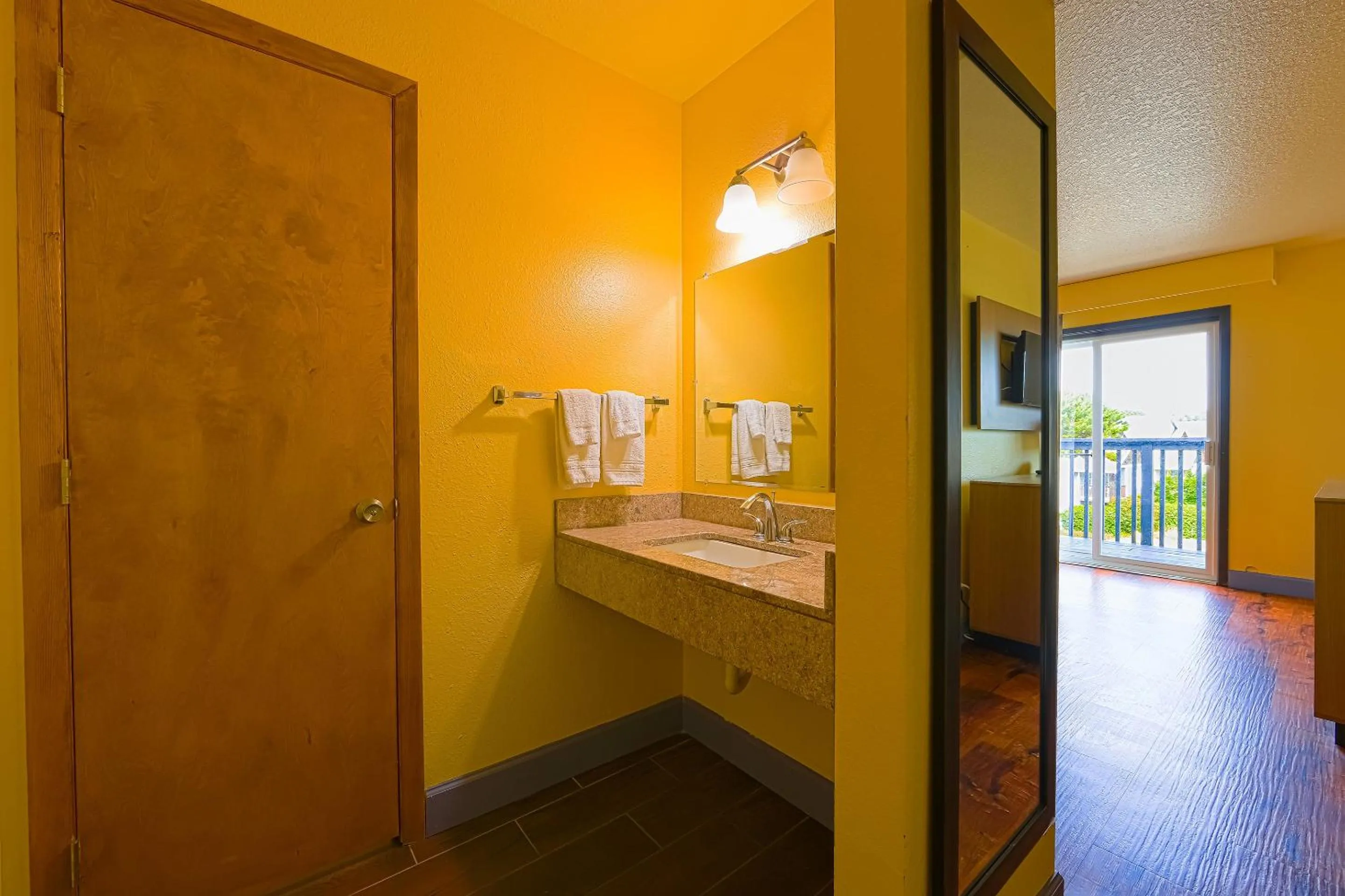 Bedroom in Coastal Inn by OYO Lincoln City - Oregon Coast Hwy