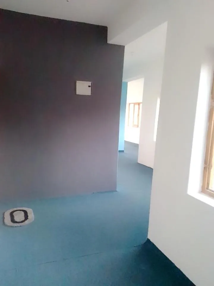 Communal lounge/ TV room in Shuma Villa