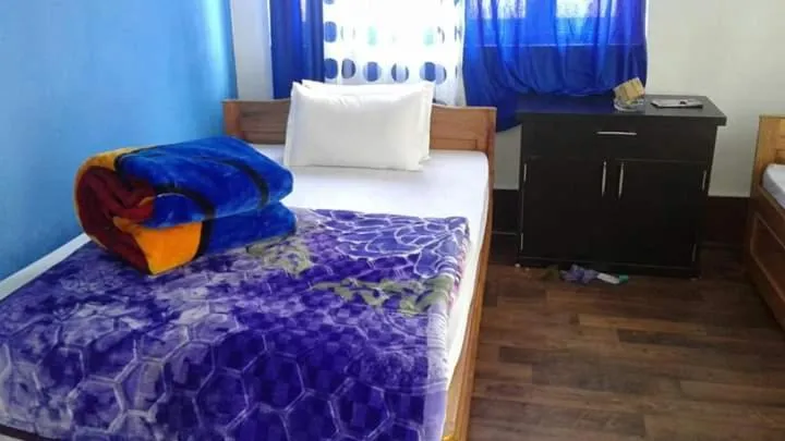 Bed in Yakchiri Homestay