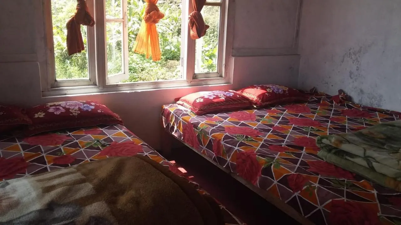 Bed in Renu Homestay Sillerygaon