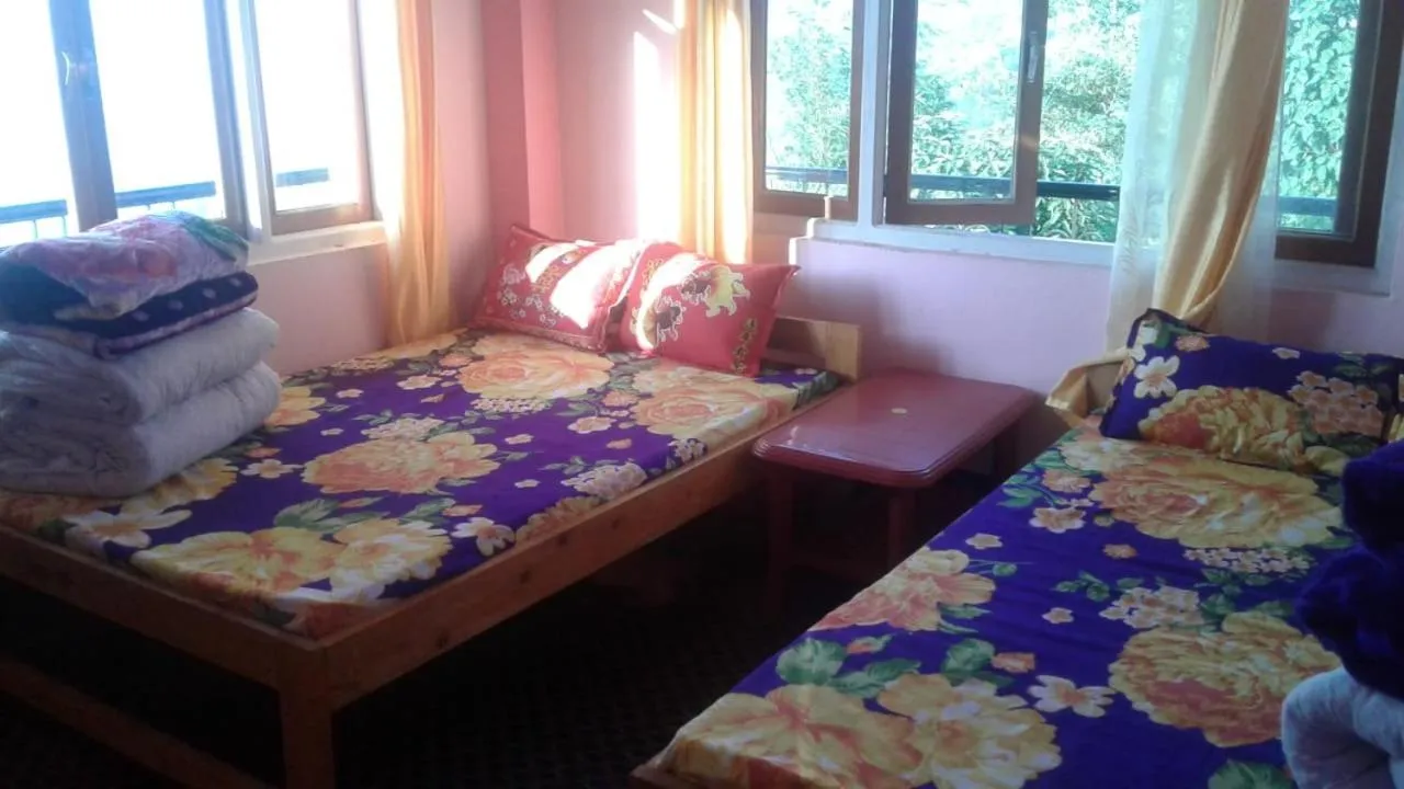Bed in Ashis Homestay
